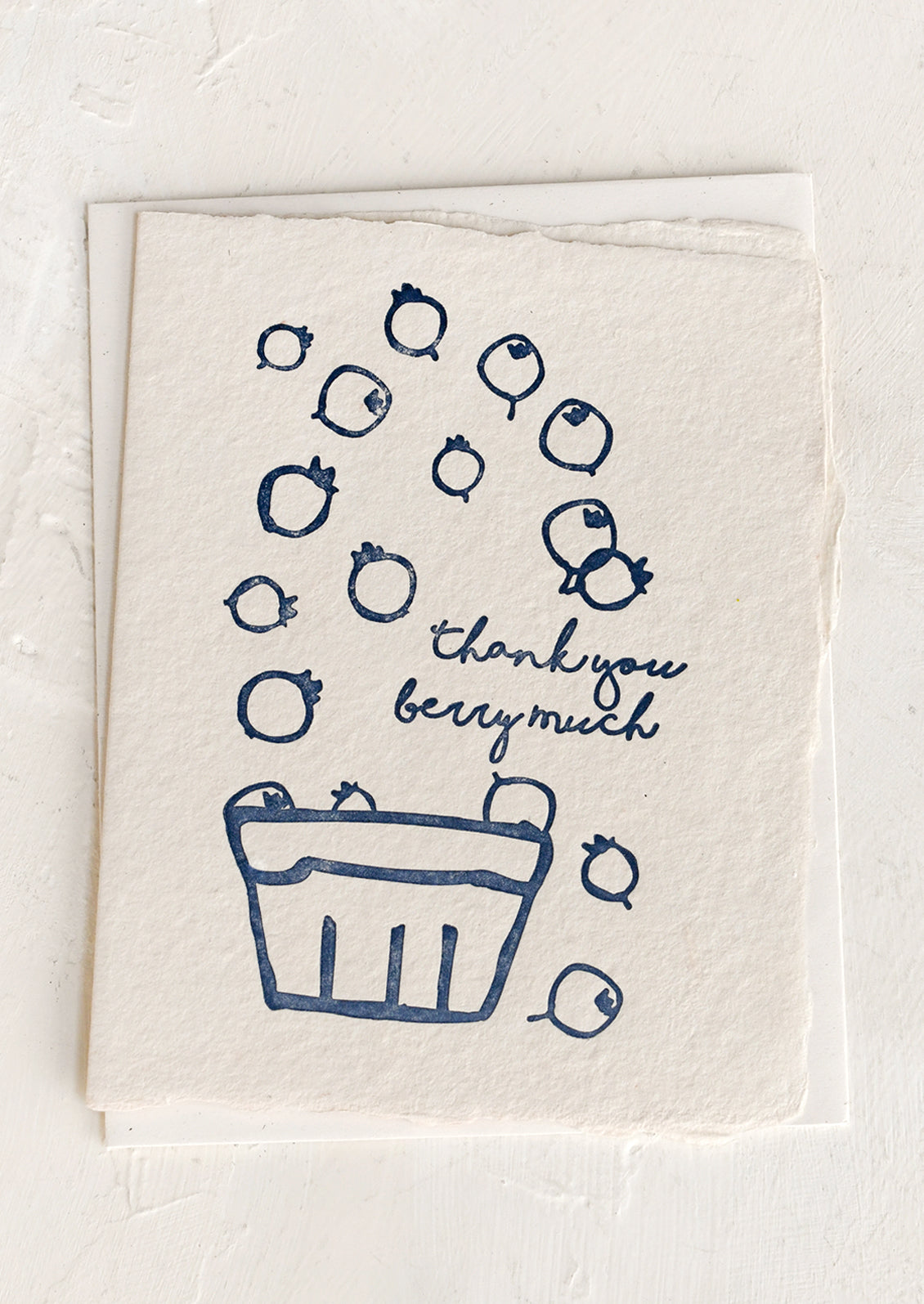 A greeting card with illustration of berries in basket, text reads "Thank you berry much".