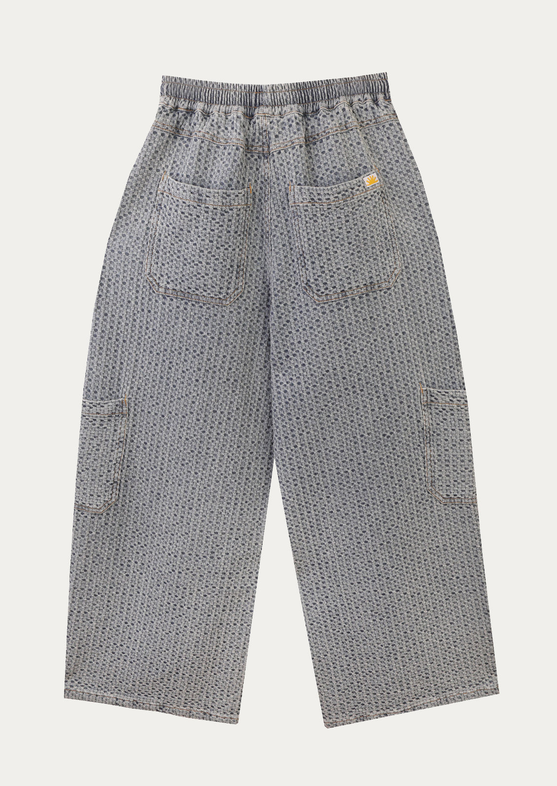 A pair of wide leg, seersucker texture pants in light blue.