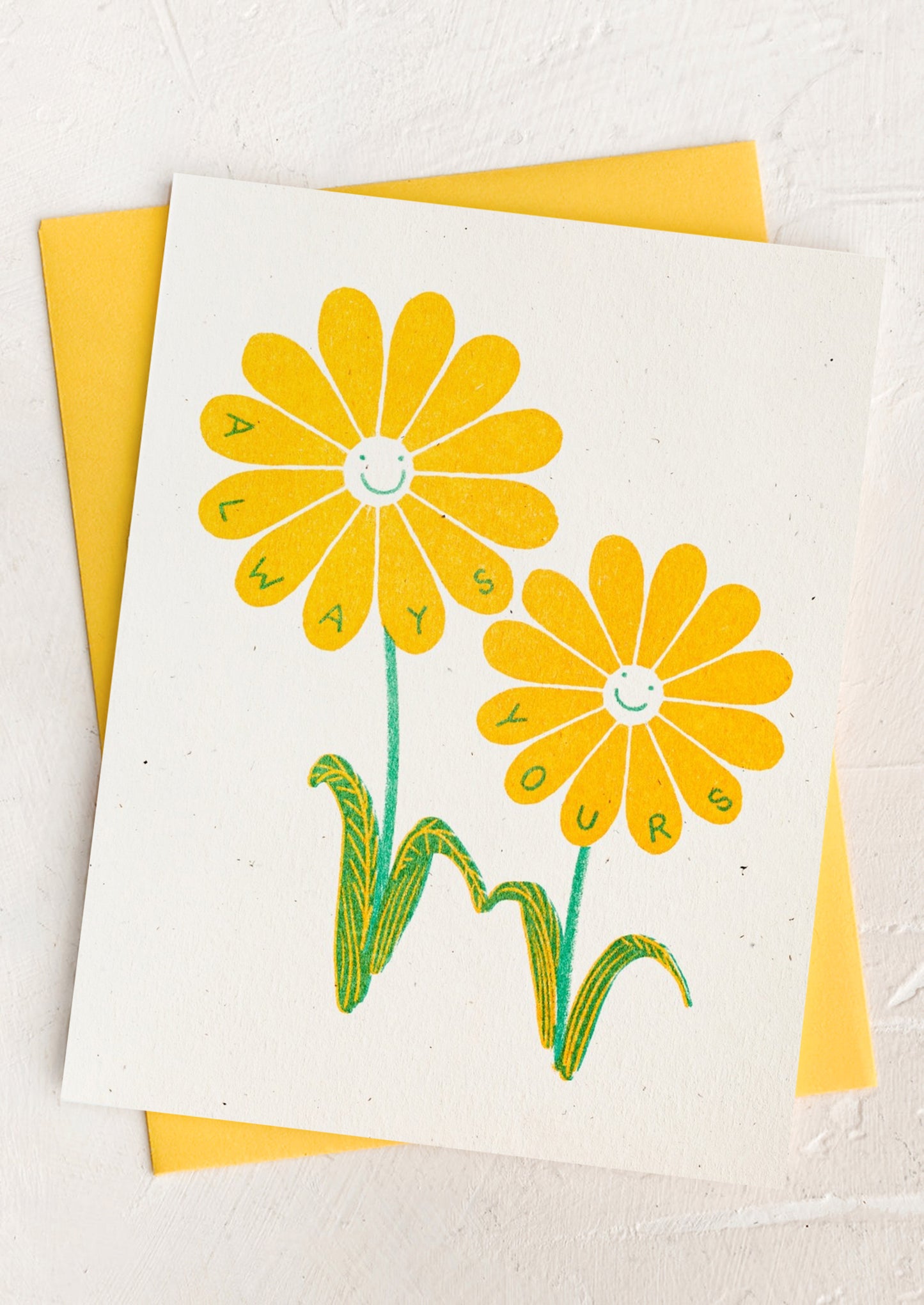 A card with flower smiley face design reading "Always yours".