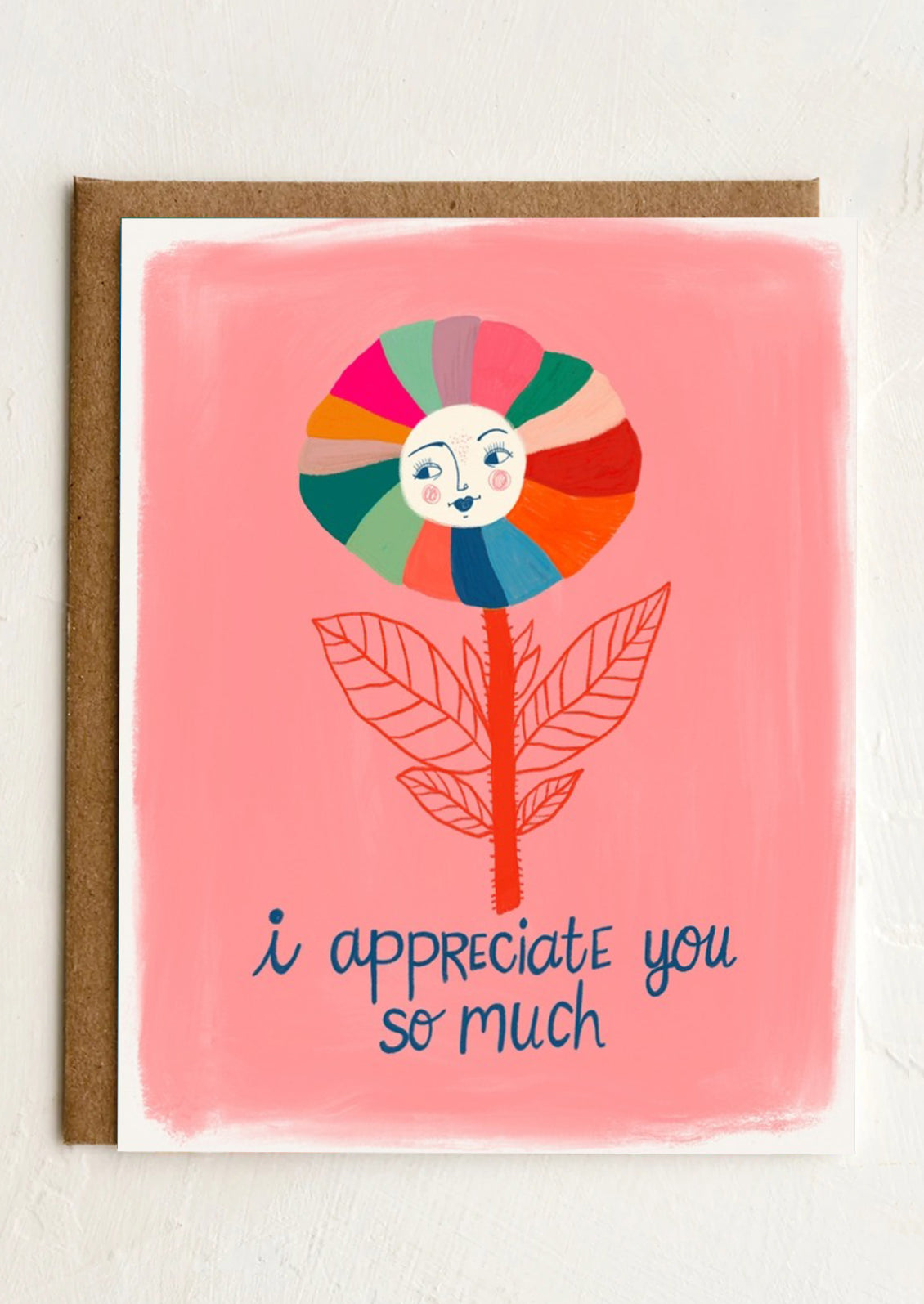 A card illustrated with a colorful flower with moon face at its center, text reads "I appreciate you so much".