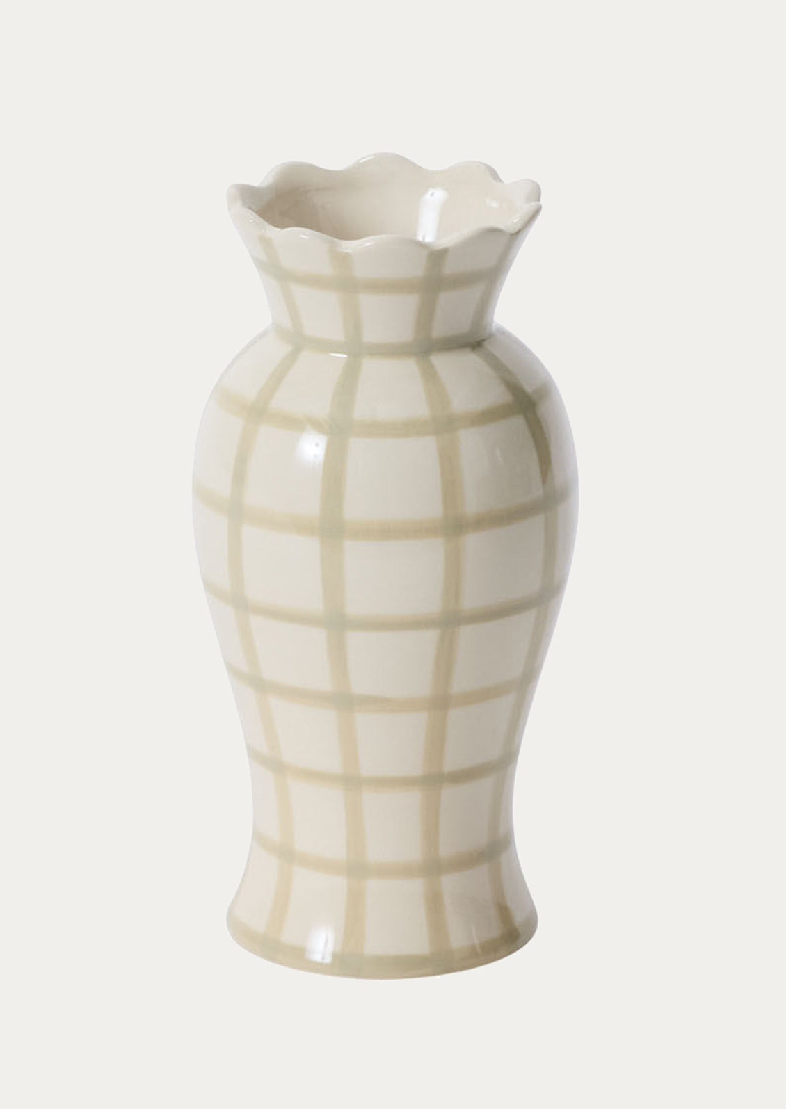 A white ceramic vase with scalloped opening and sage green grid pattern throughout.