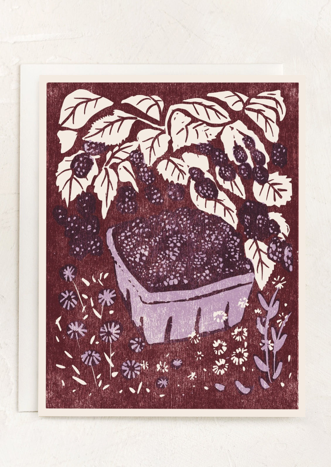 A card with woodstamp image of blackberries.