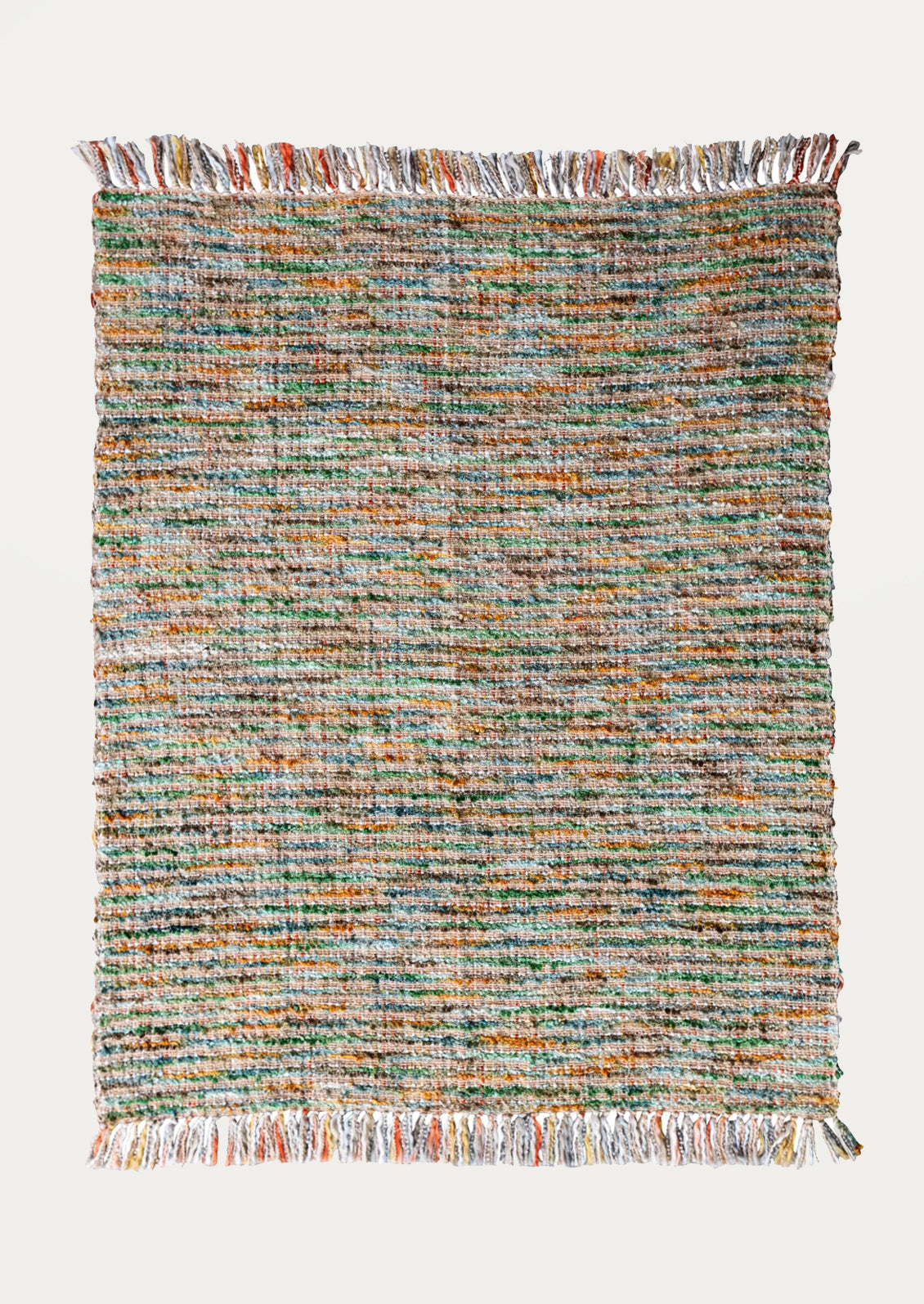 A throw blanket in multicolor boucle tweed.