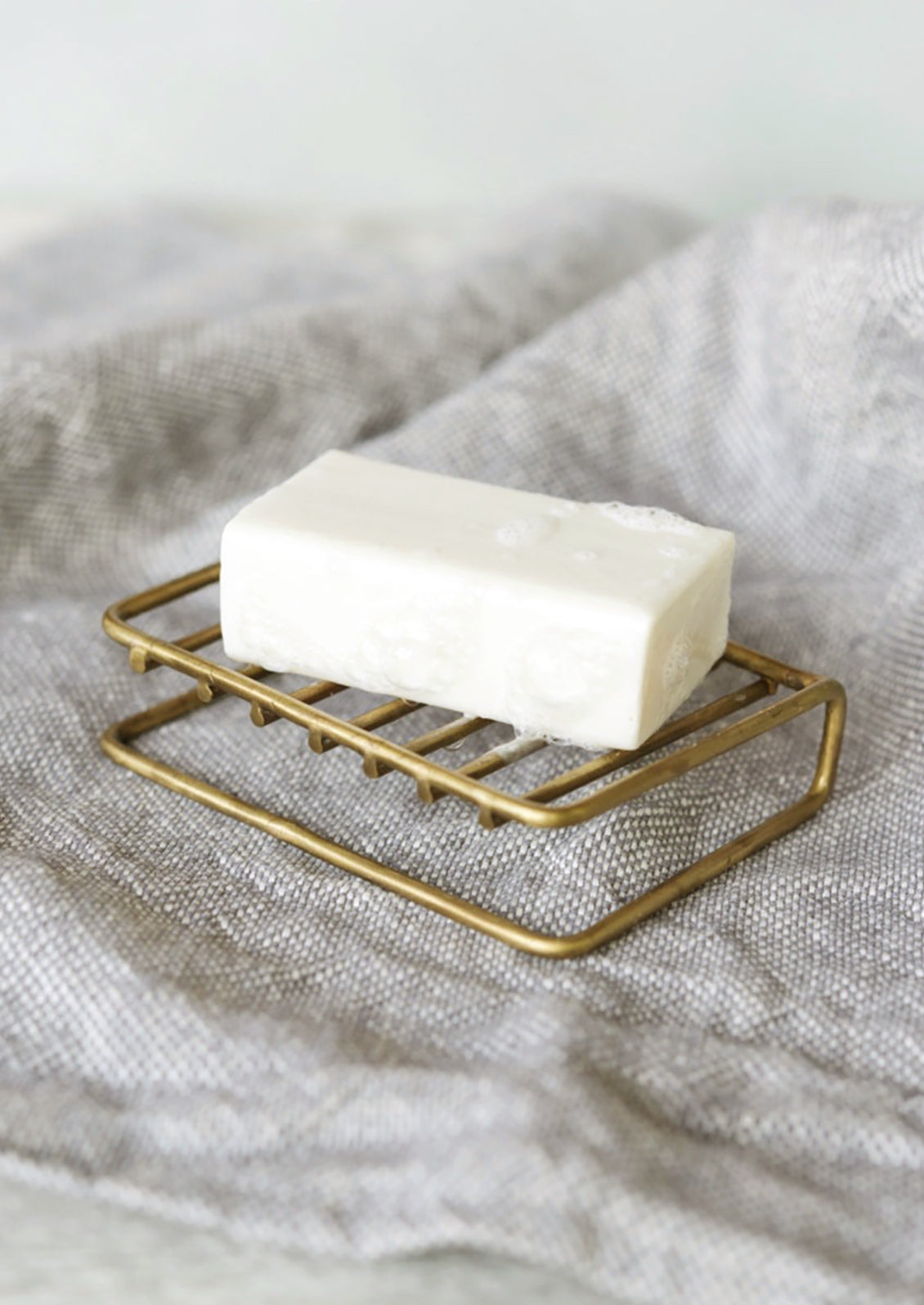 A wire brass soap stand.