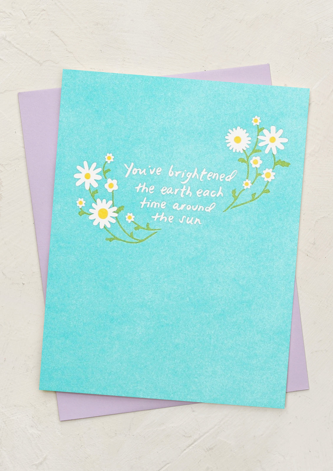 A card reading "You've brightened the earth each time around the sun".