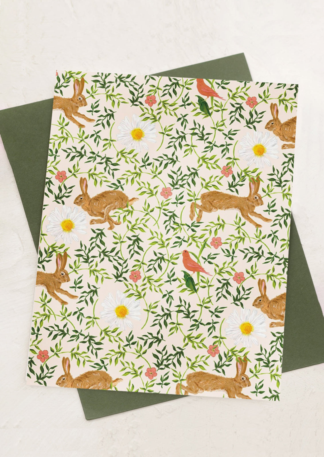 A text-free card with mirrored image of bunnies, flowers and birds.