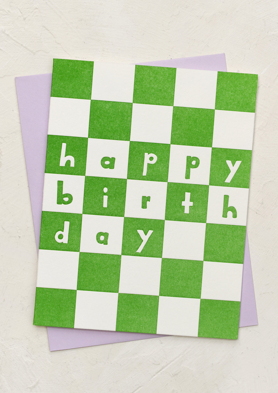 A green checker print card reading "Happy Birthday".