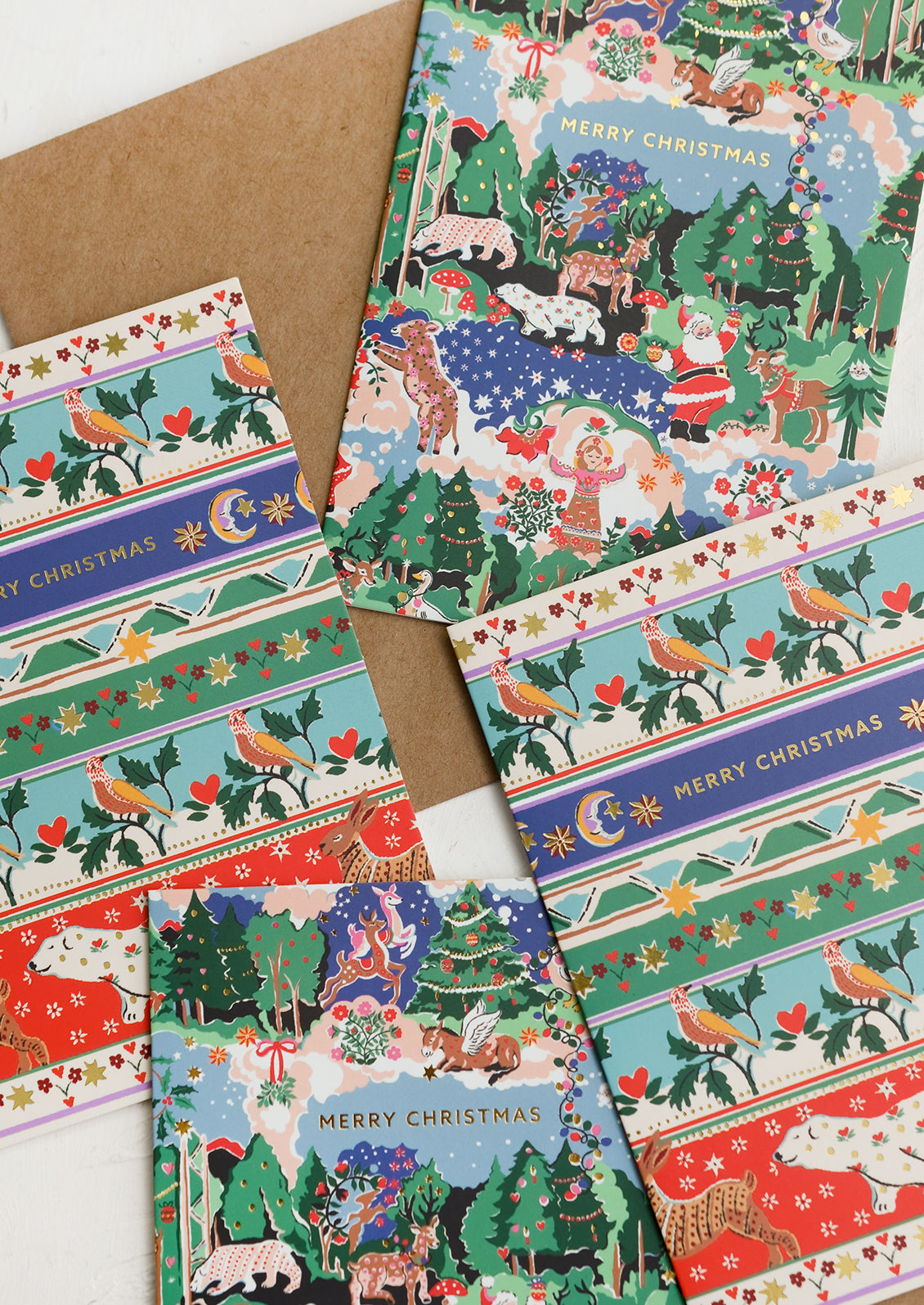 A set of Christmas cards in two different whimsical prints.