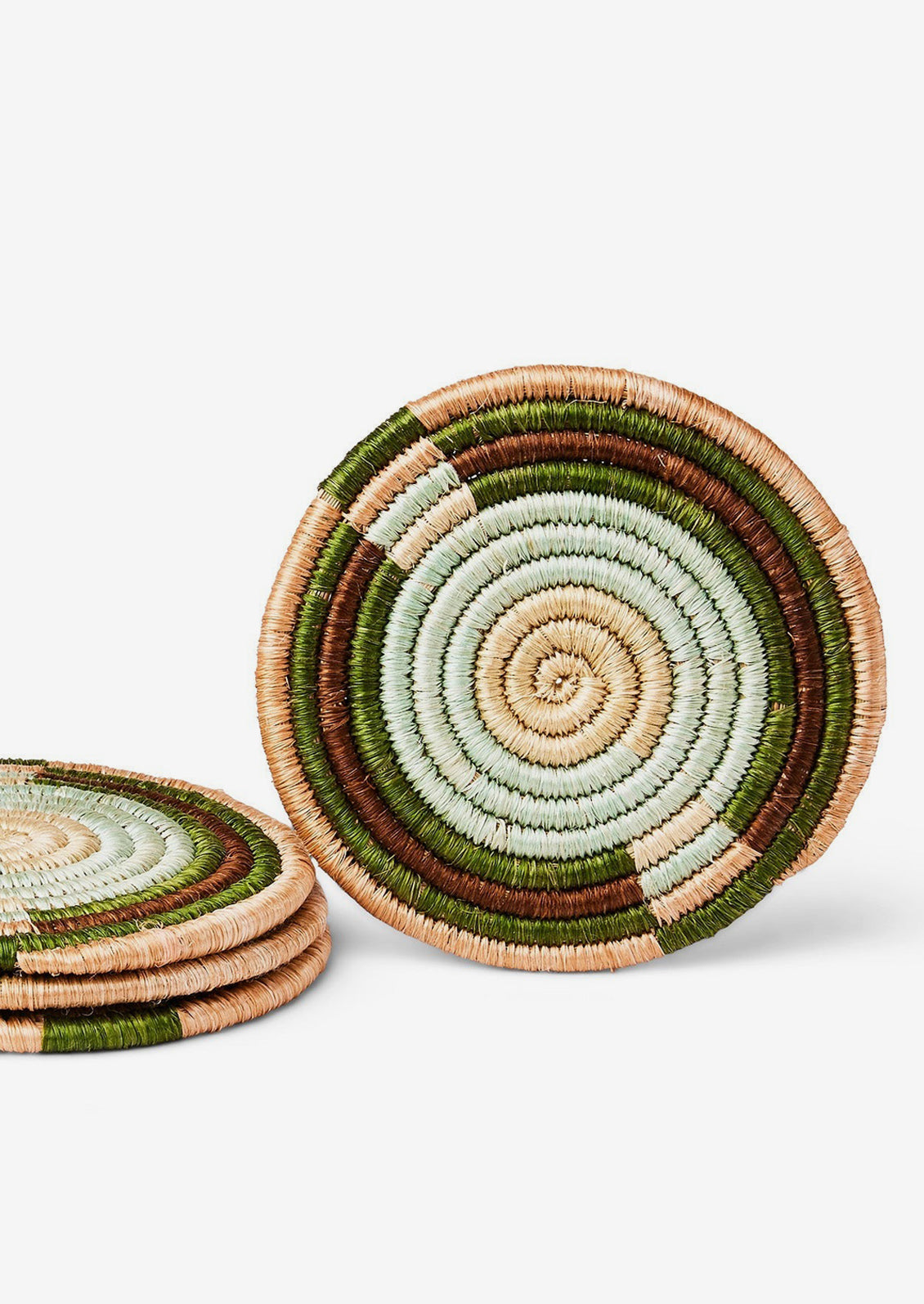 A set of colorblock sweetgrass coasters in earth tone color palette.