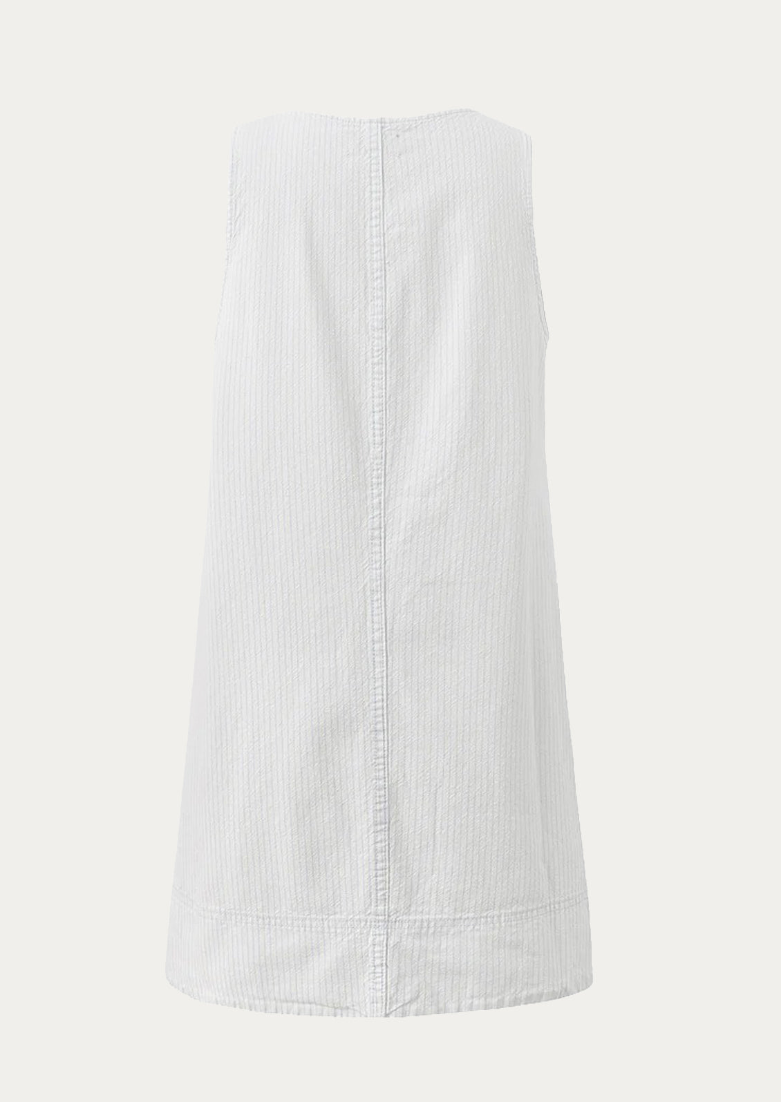 White shift dress on a light gray background