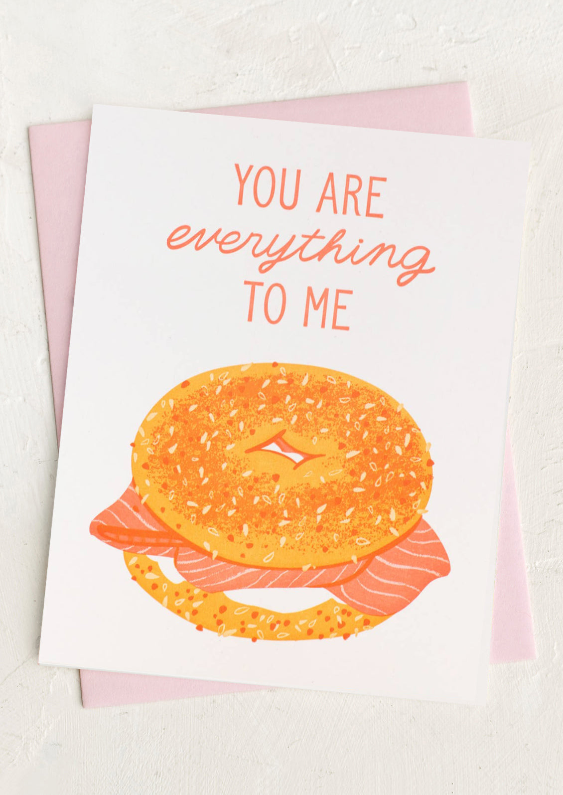 Card with a bagel illustration and text 'You are everything to me' on a white background.