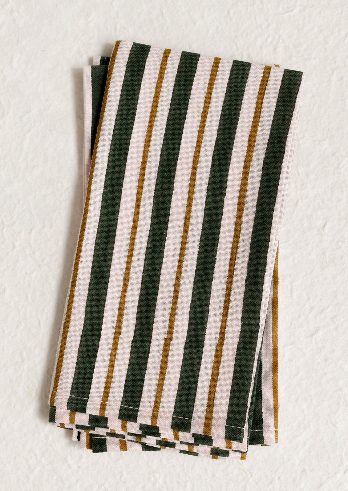 A pair of cotton napkins in pink and emerald green stripe.