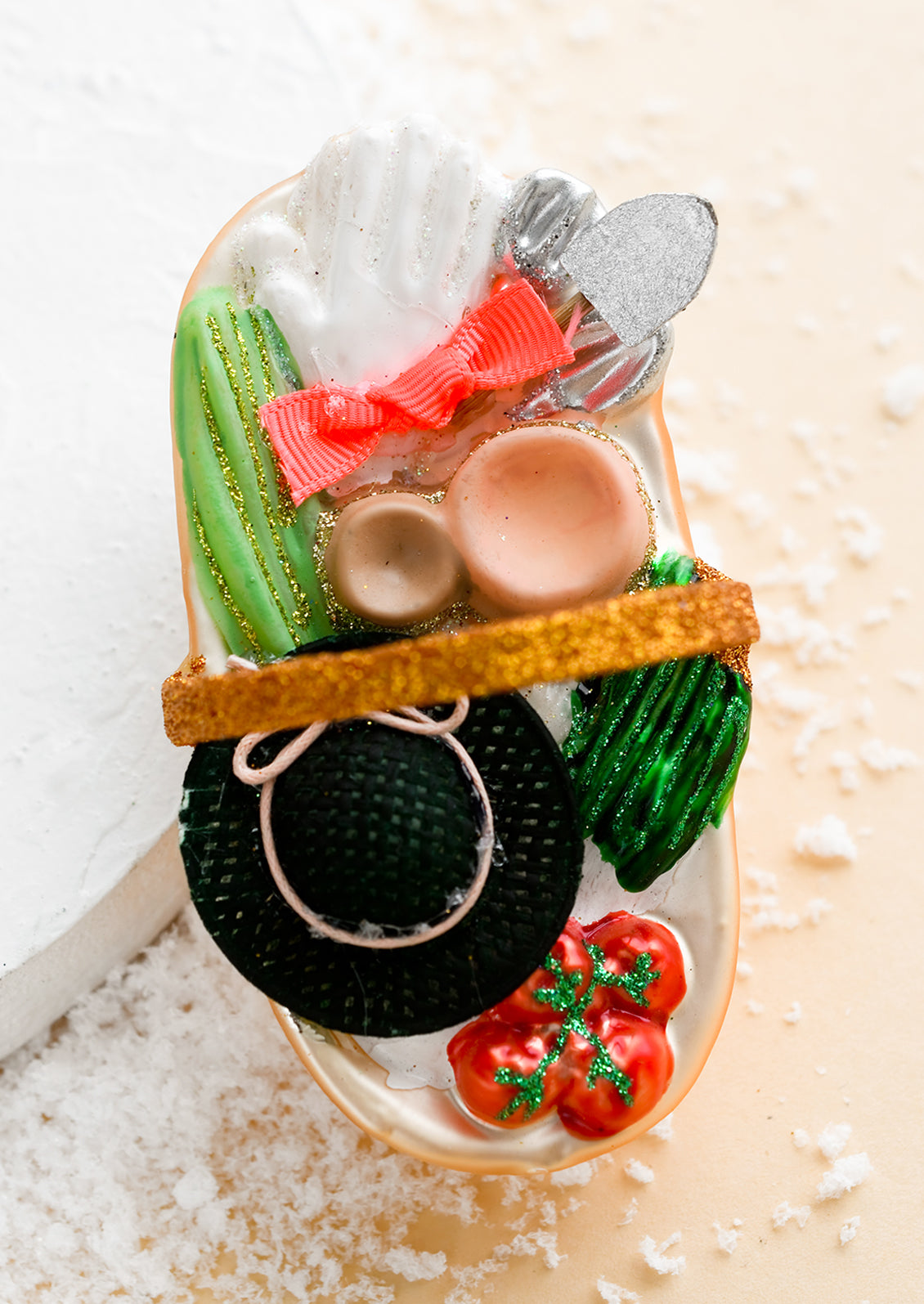 A glass ornament of a garden trug.