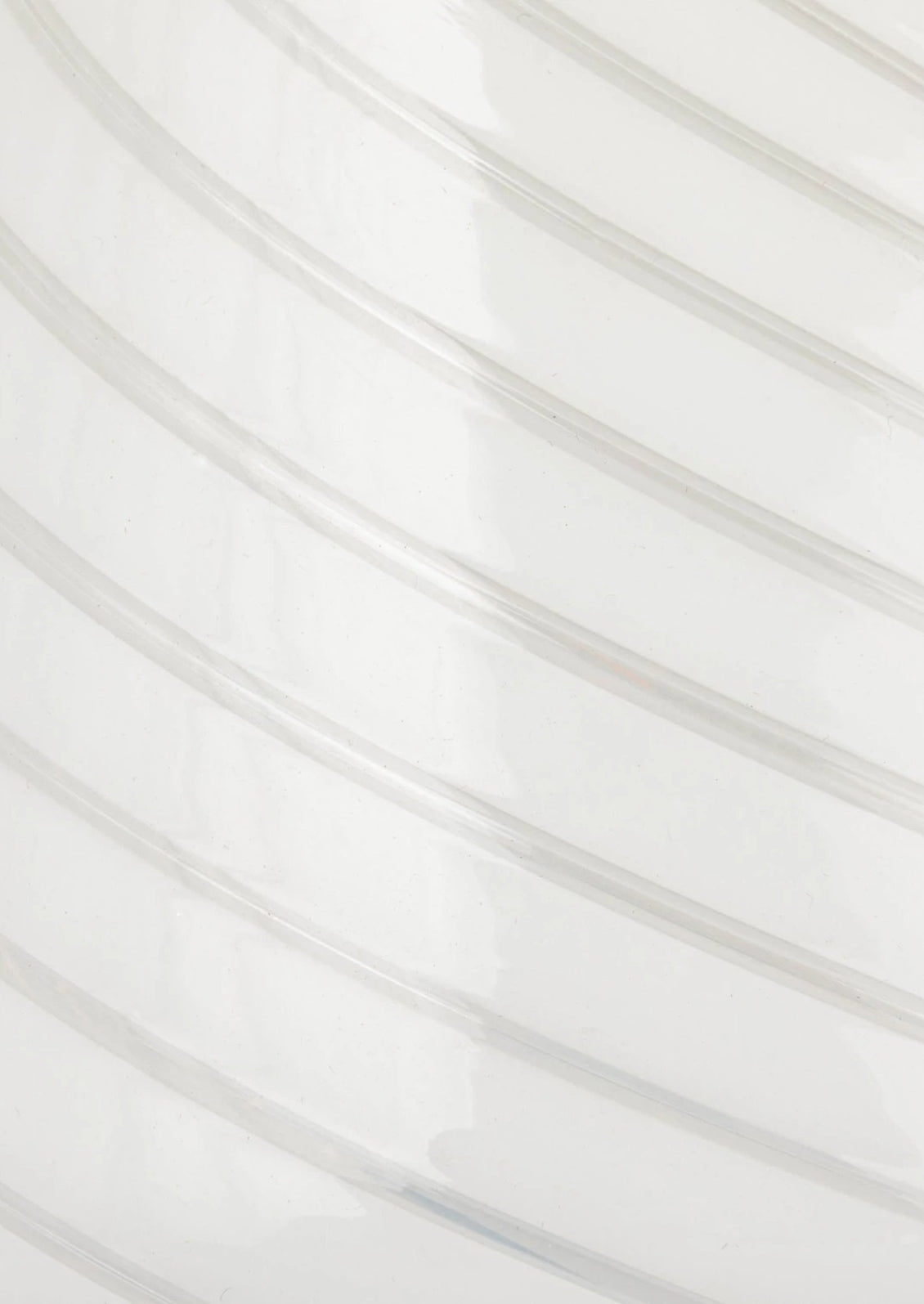 A white art glass table lamp with white/clear spiral pattern.