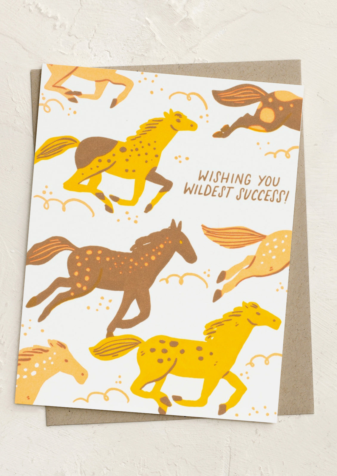 A card with image of horses, text reads "Wishing you wildest success!".