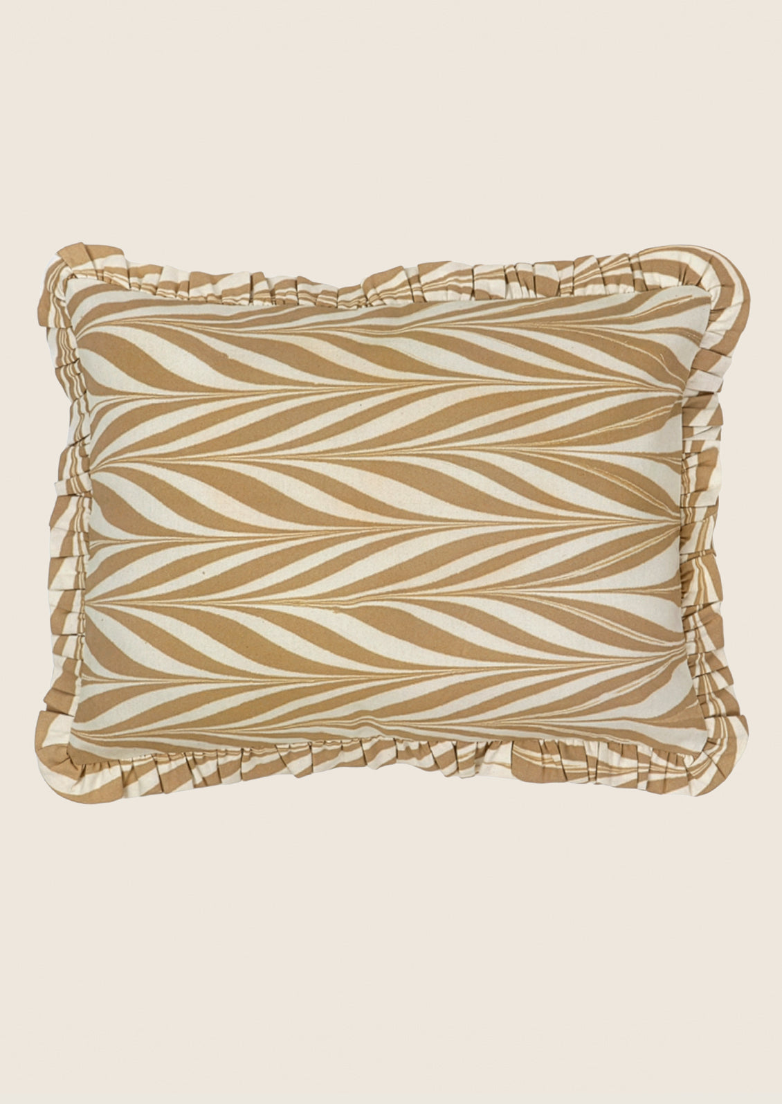 Decorative pillow with wavy pattern on a beige background