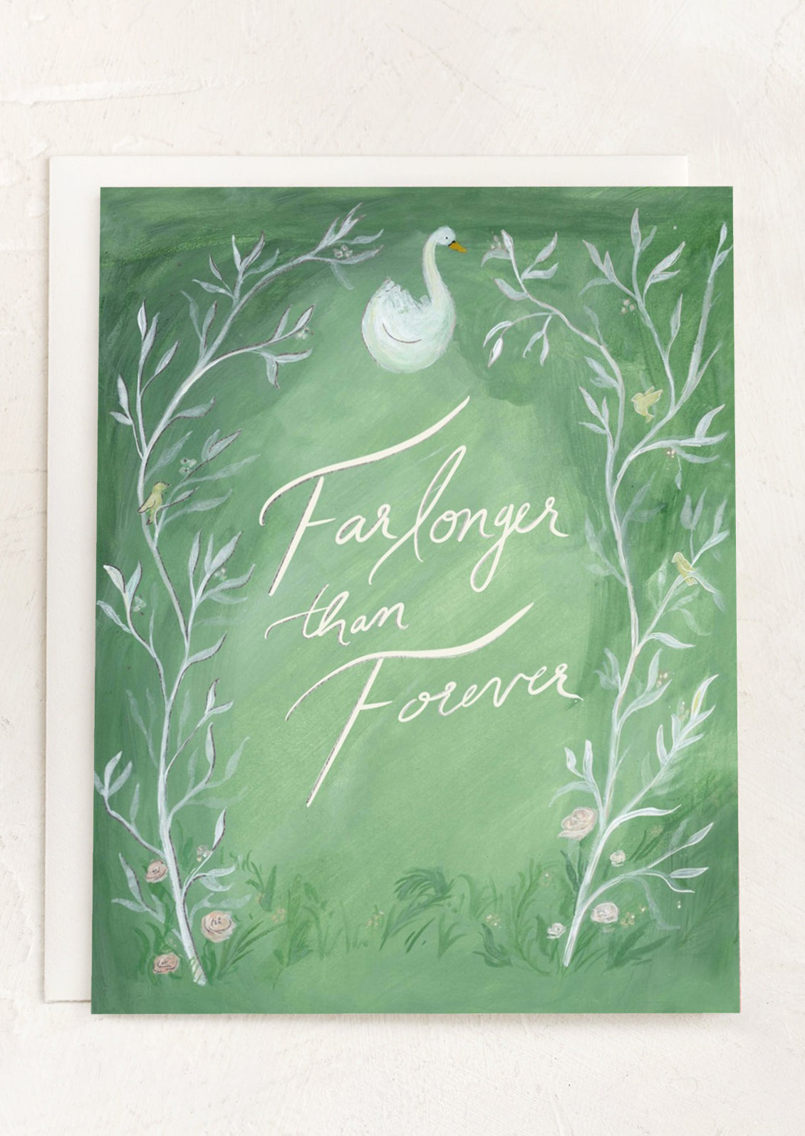 A swan print card, text reads "Far longer than forever".