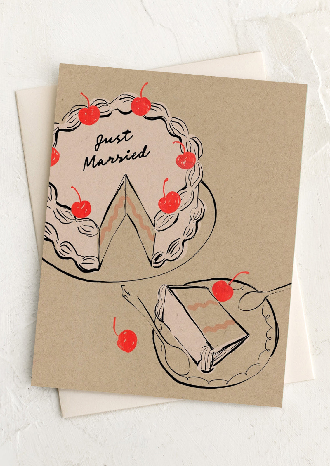 Kraft paper card with 'Just Married' text and cake illustration on a white background