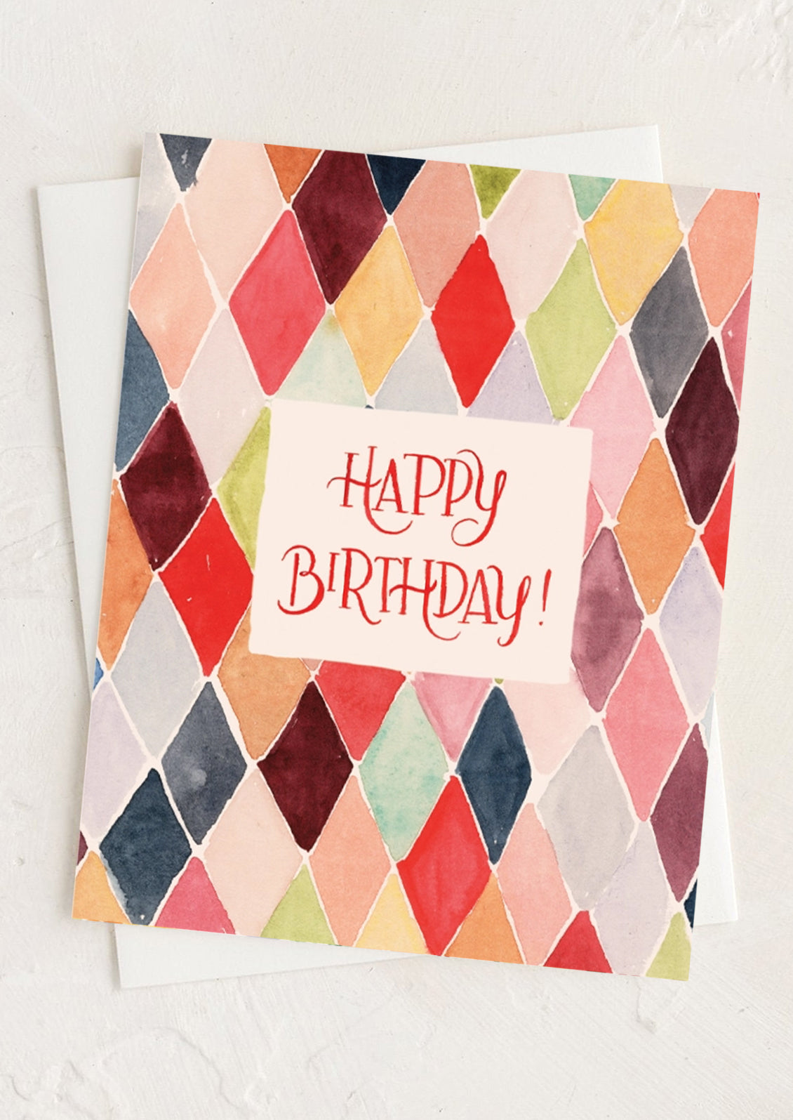 A colorful diamond mosaic print birthday card.