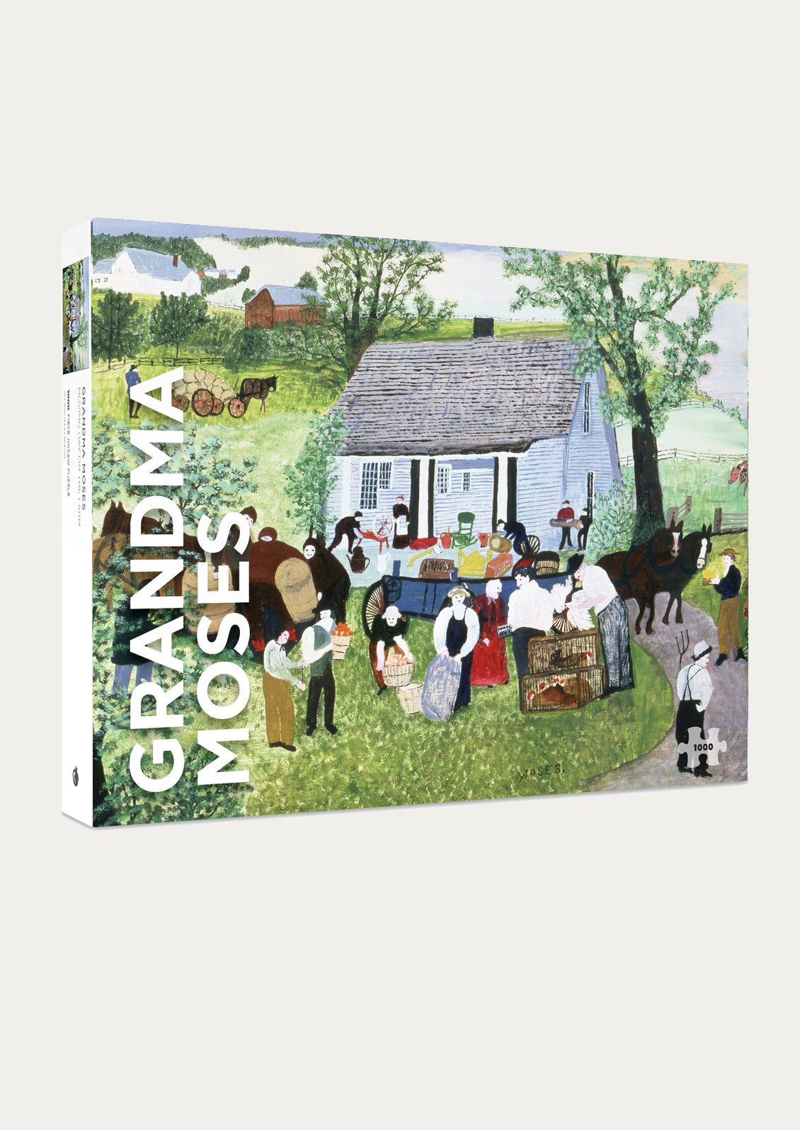 Puzzle box of 'Grandma Moses' with a painting of a village scene on the cover.