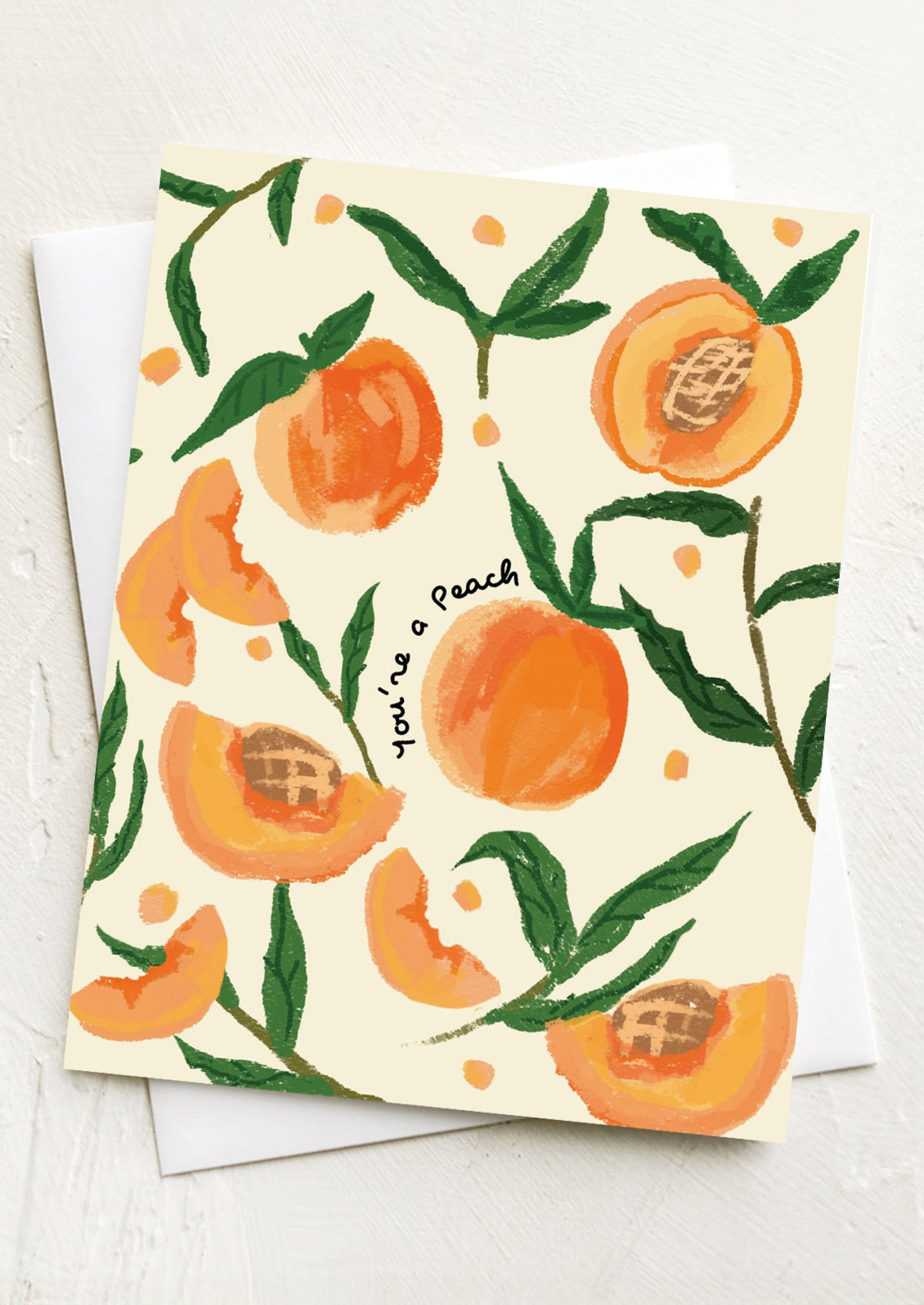 A greeting card with illustrations of peaches, text reads "You're A Peach".