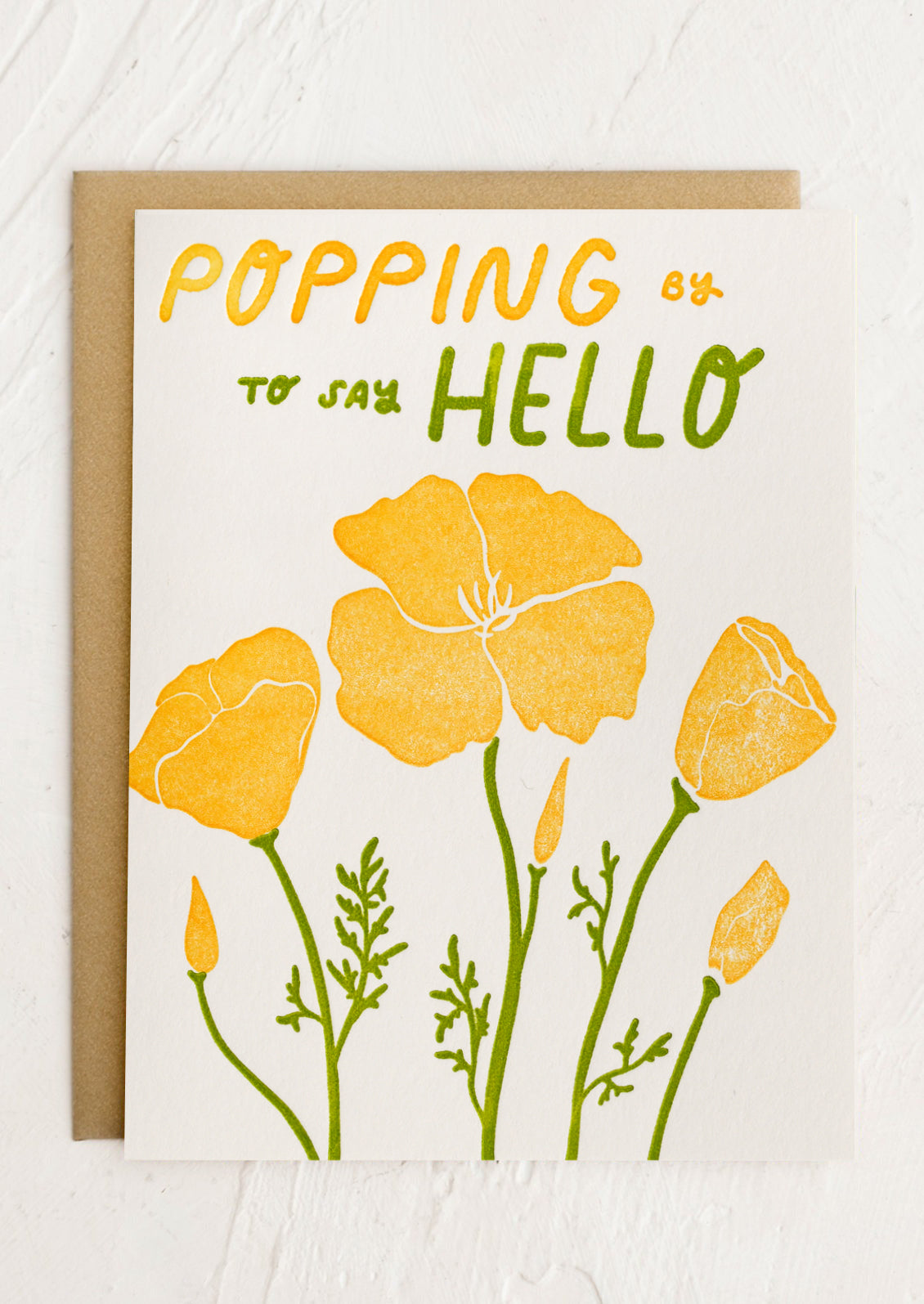 A card with illustration of yellow poppies, text reads "Popping by to say hello".