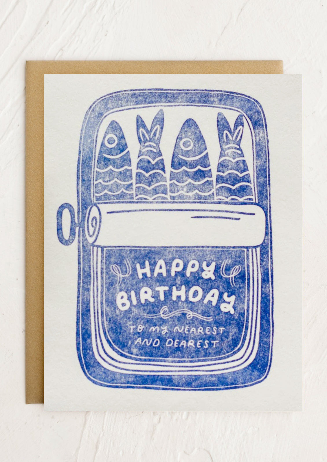 A card with illustration of sardines in tin, text reads "Happy birthday to my nearest and dearest".