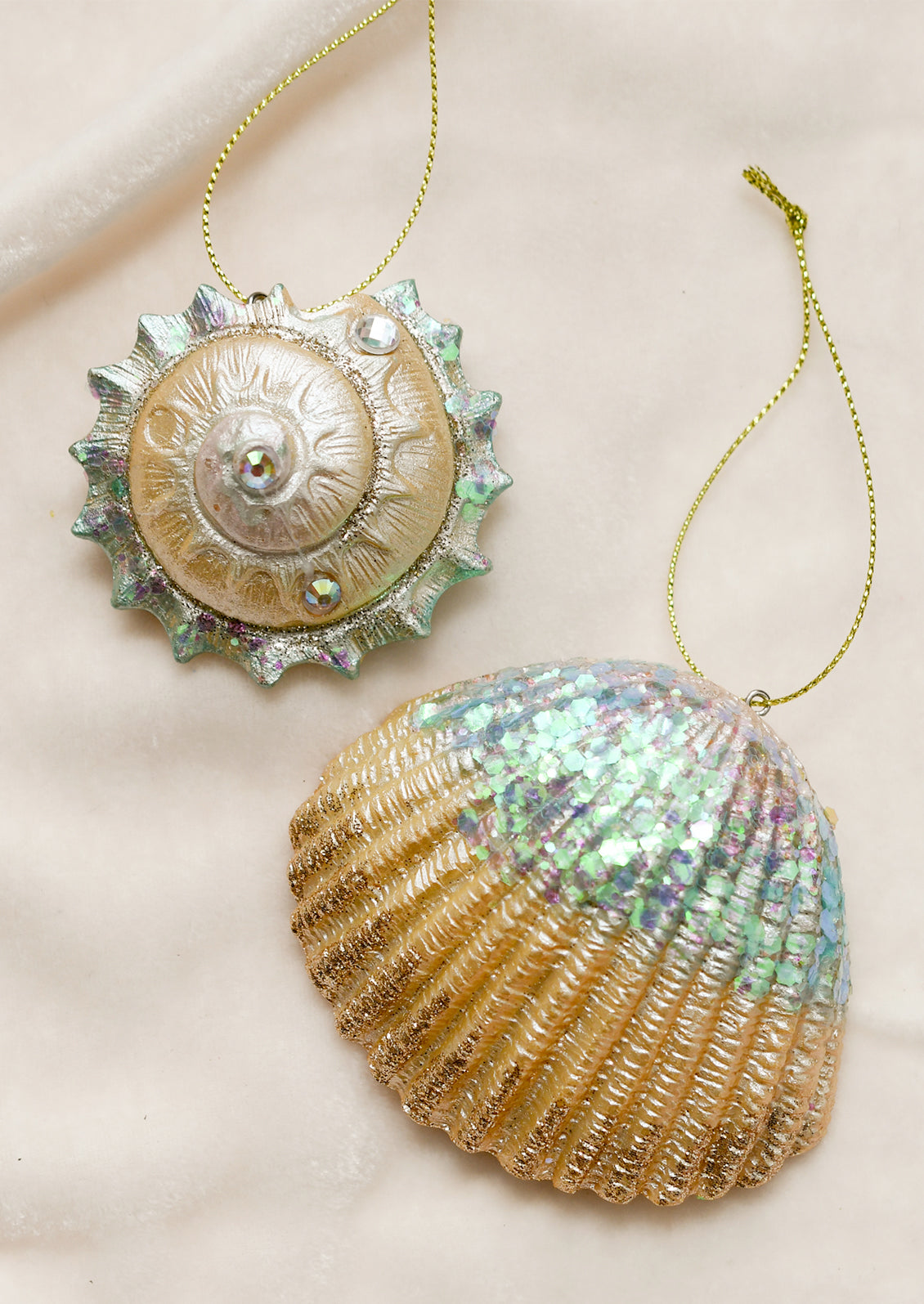 Shell ornaments with glitter detail.