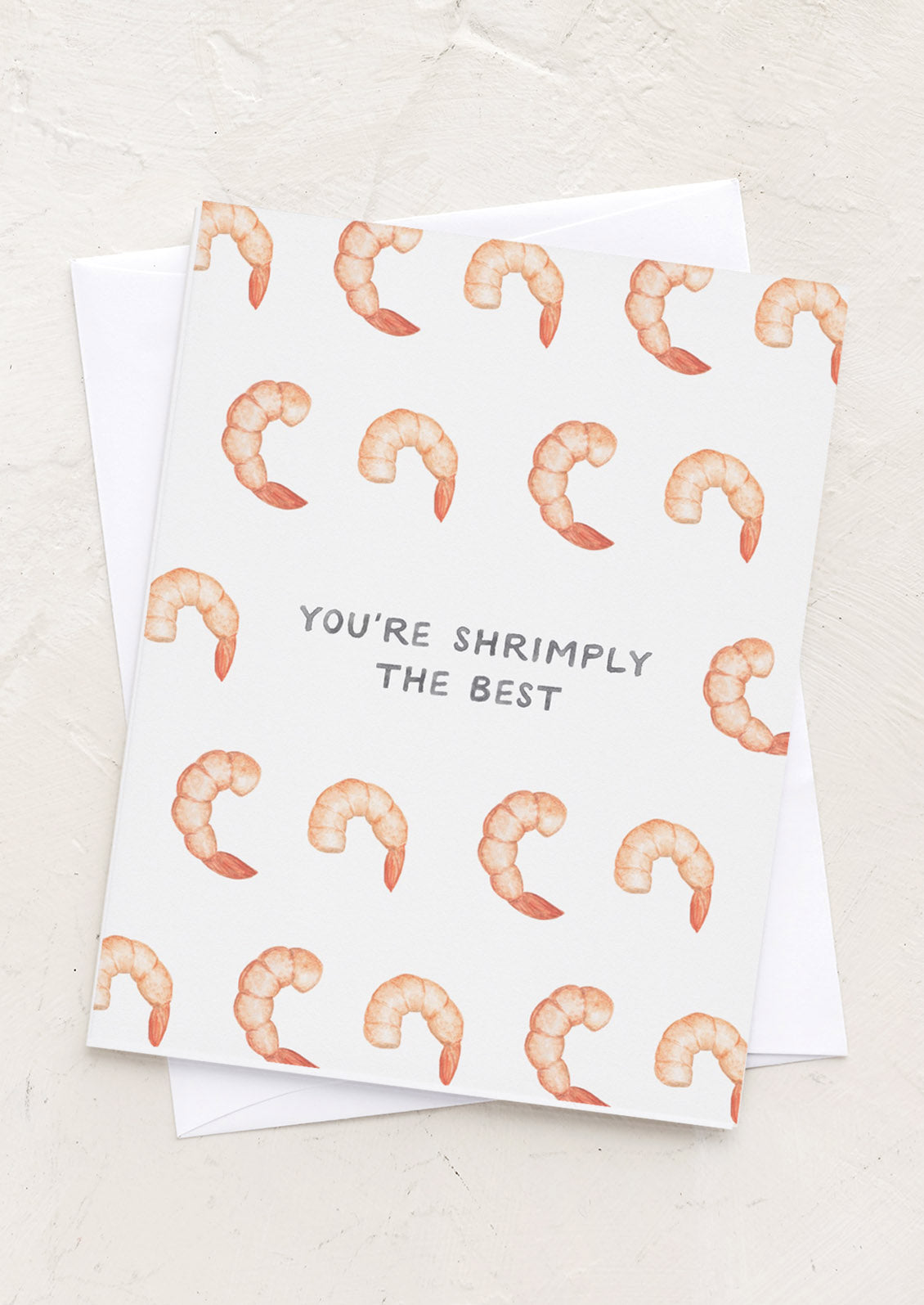 A card with images of shrimp, text reads "You're shrimply the best".