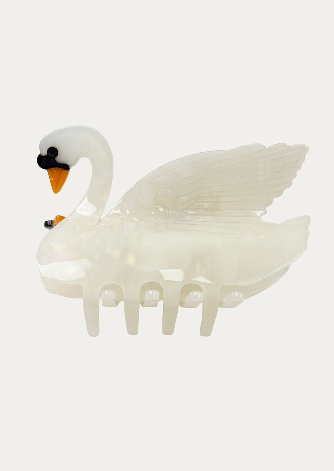 Swan-shaped hair clip on a white background