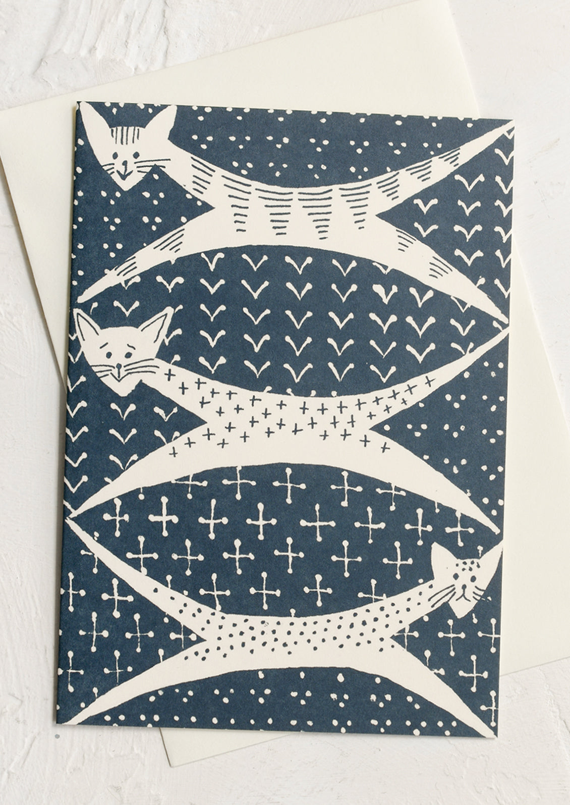 A greeting card with quirky mid century style cat pattern.