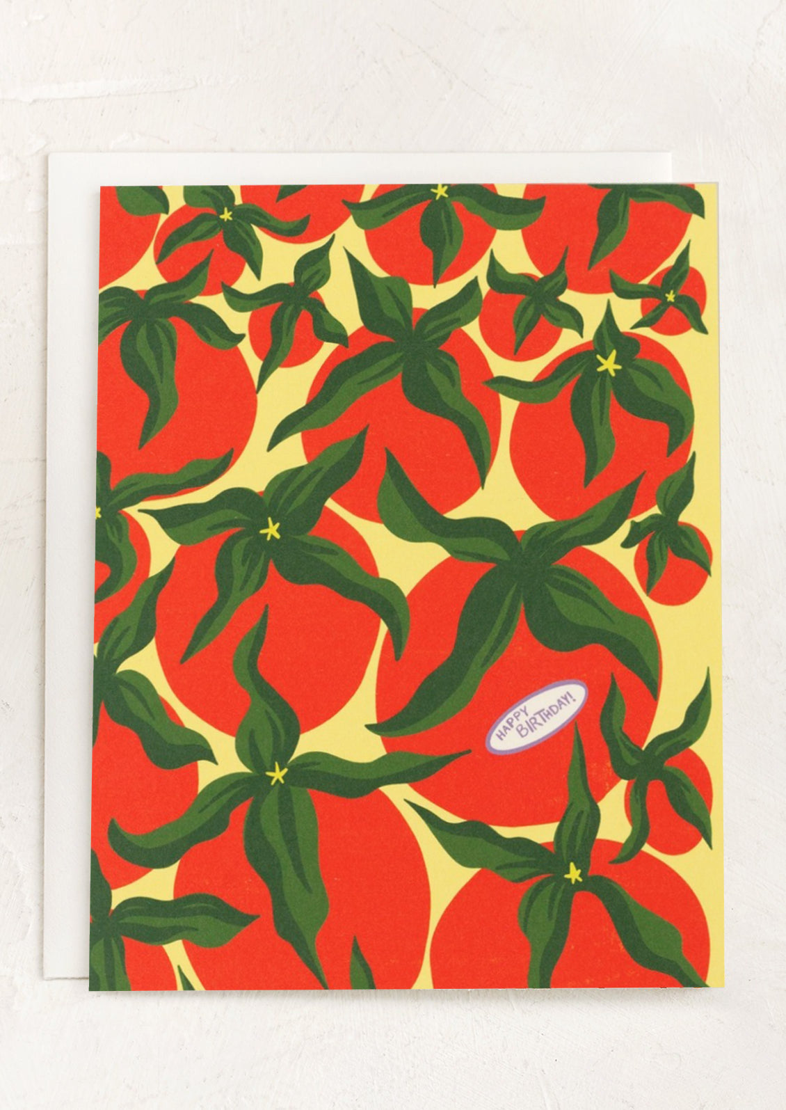 A tomato print card reading "Happy birthday!".