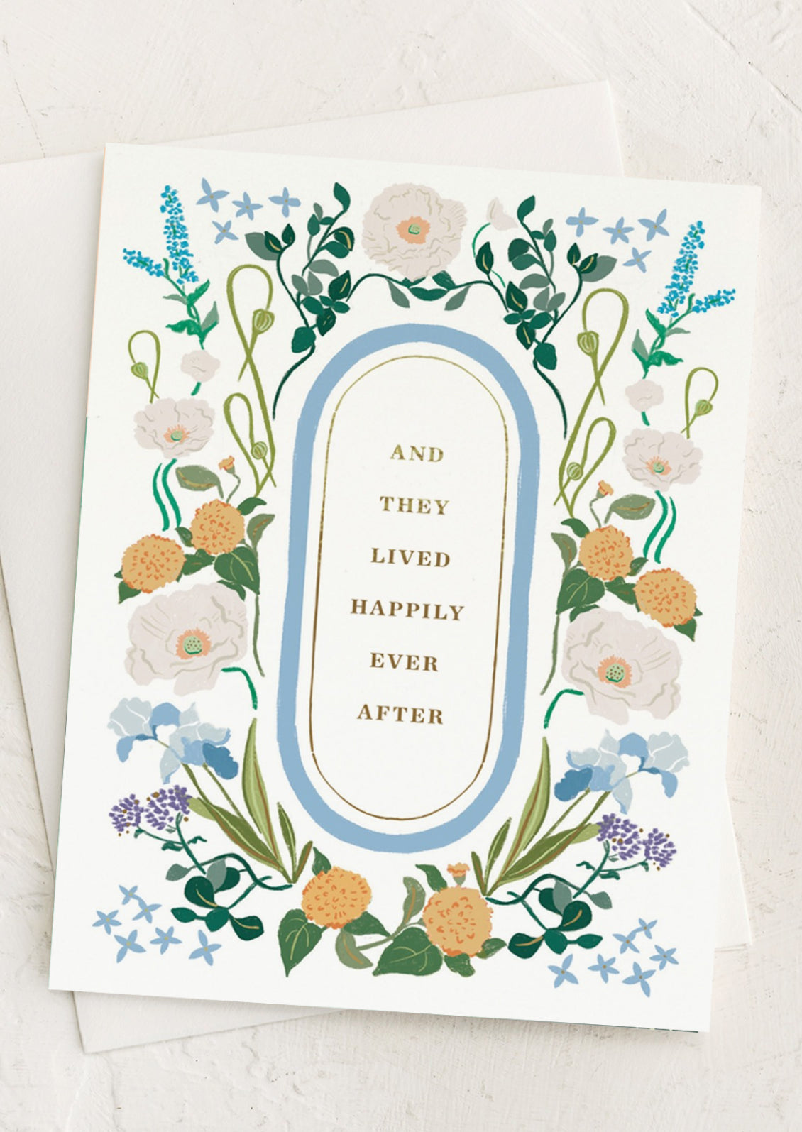 A floral print card reading "And they lived happily ever after".