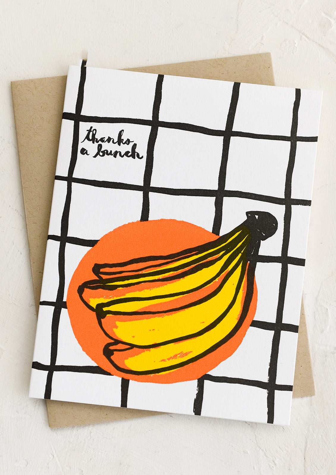 A greeting card with image of bananas and text reads "Thanks a bunch".