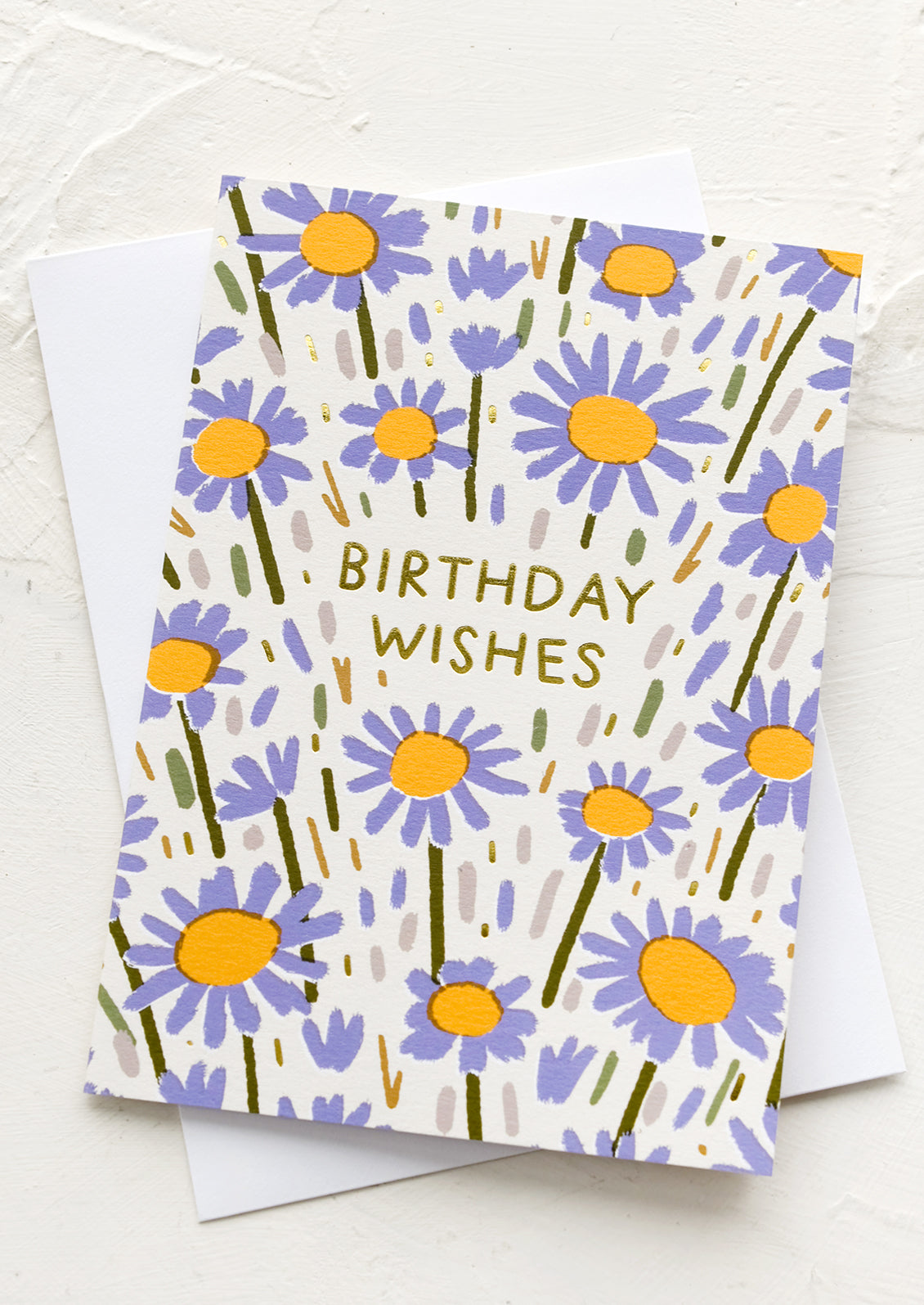 A card with purple flowers and text reading "Birthday Wishes".