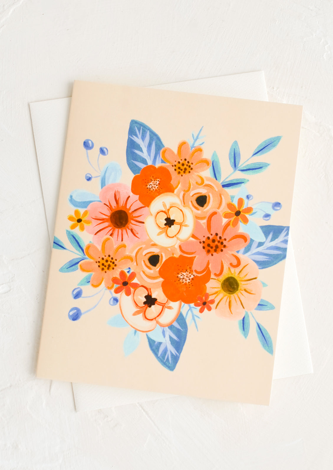 A greeting card with orange and blue bouquet.