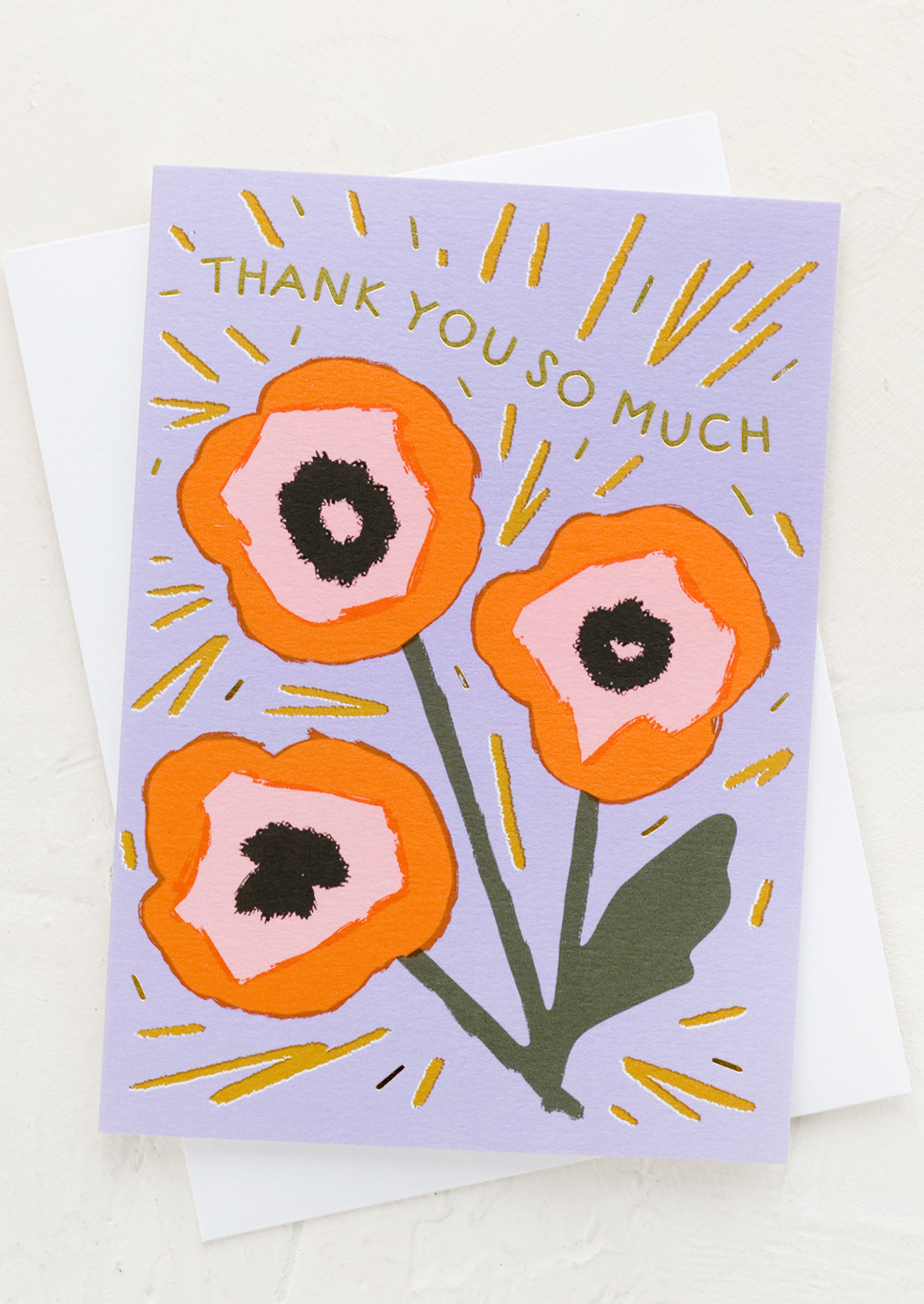 A purple greeting card with floral print reading "Thank you so much".