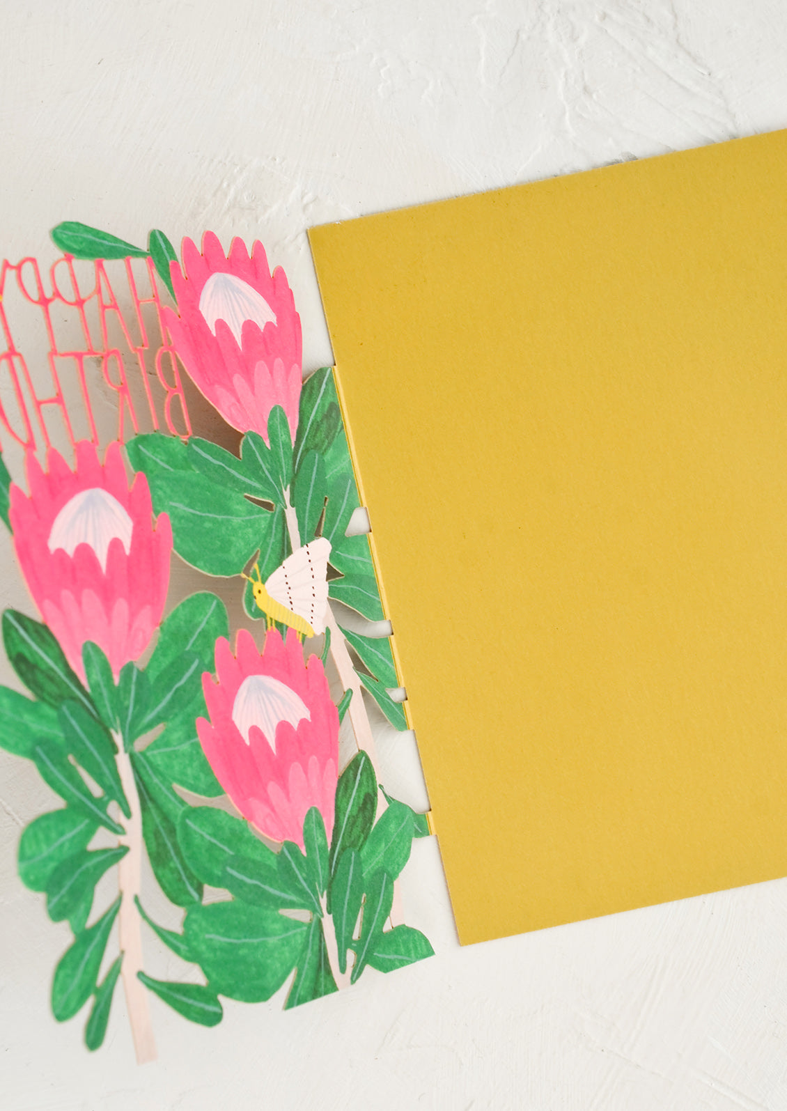 Blank yellow interior of a greeting card.