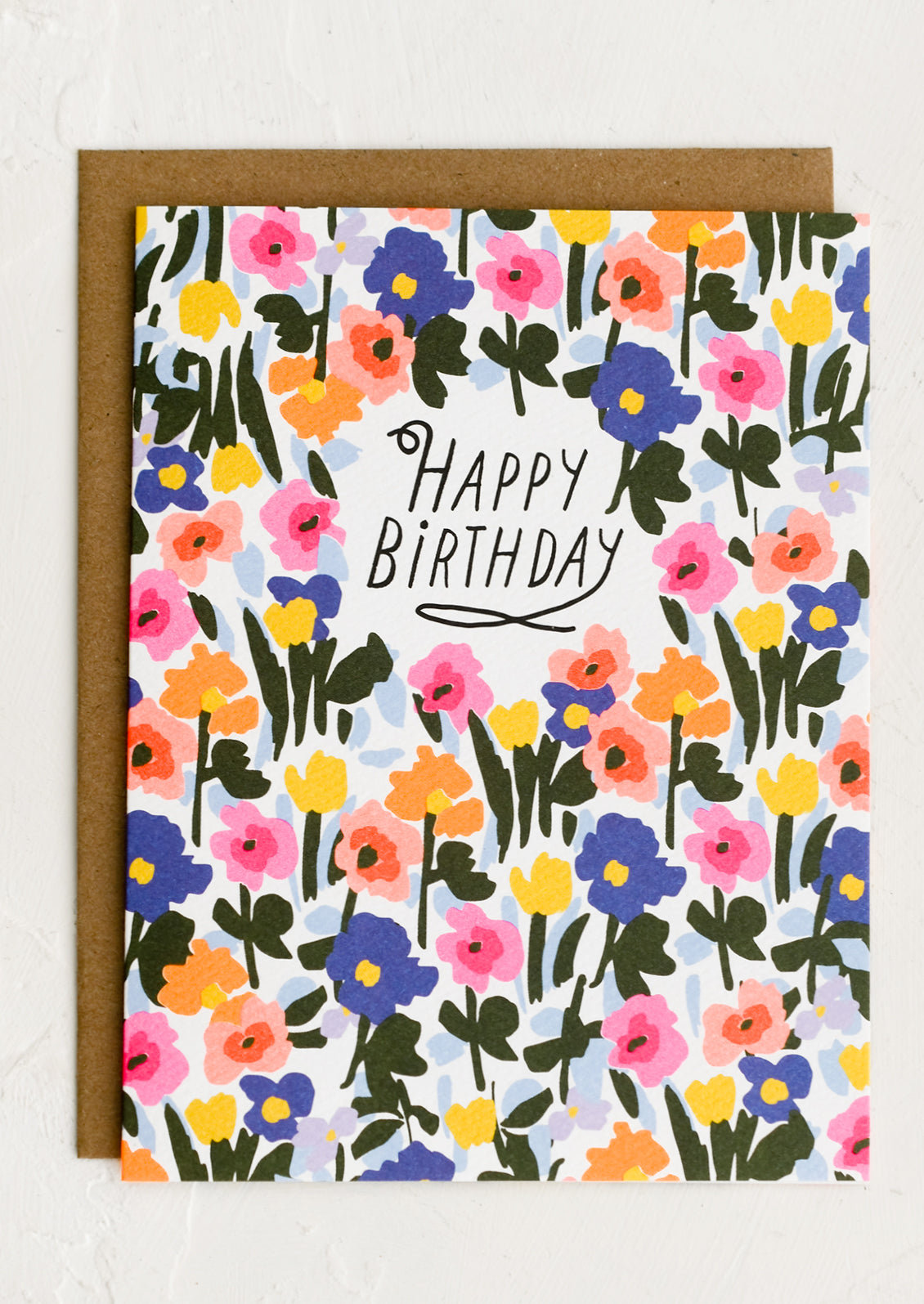 A neon floral print card with "Happy birthday" written at center.