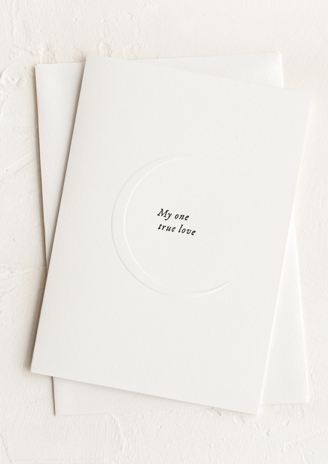 A card with raised moon design, text read "My one true love".