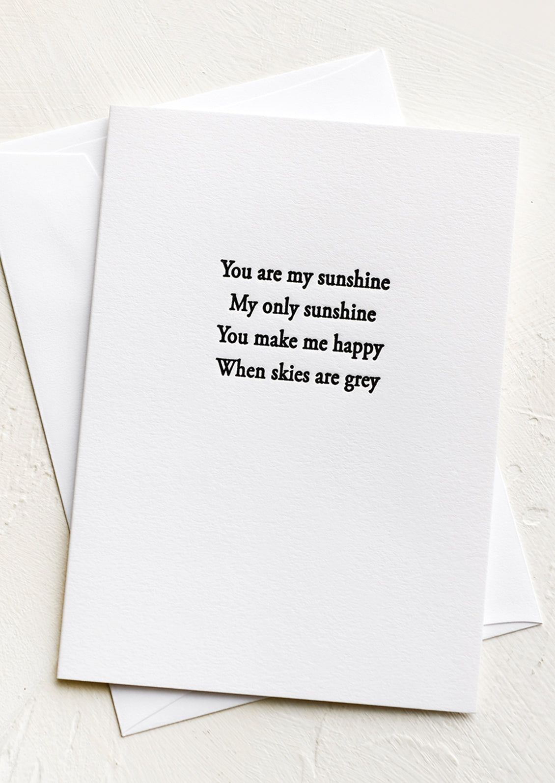 A greeting card with written lyrics of "my only sunshine" song.