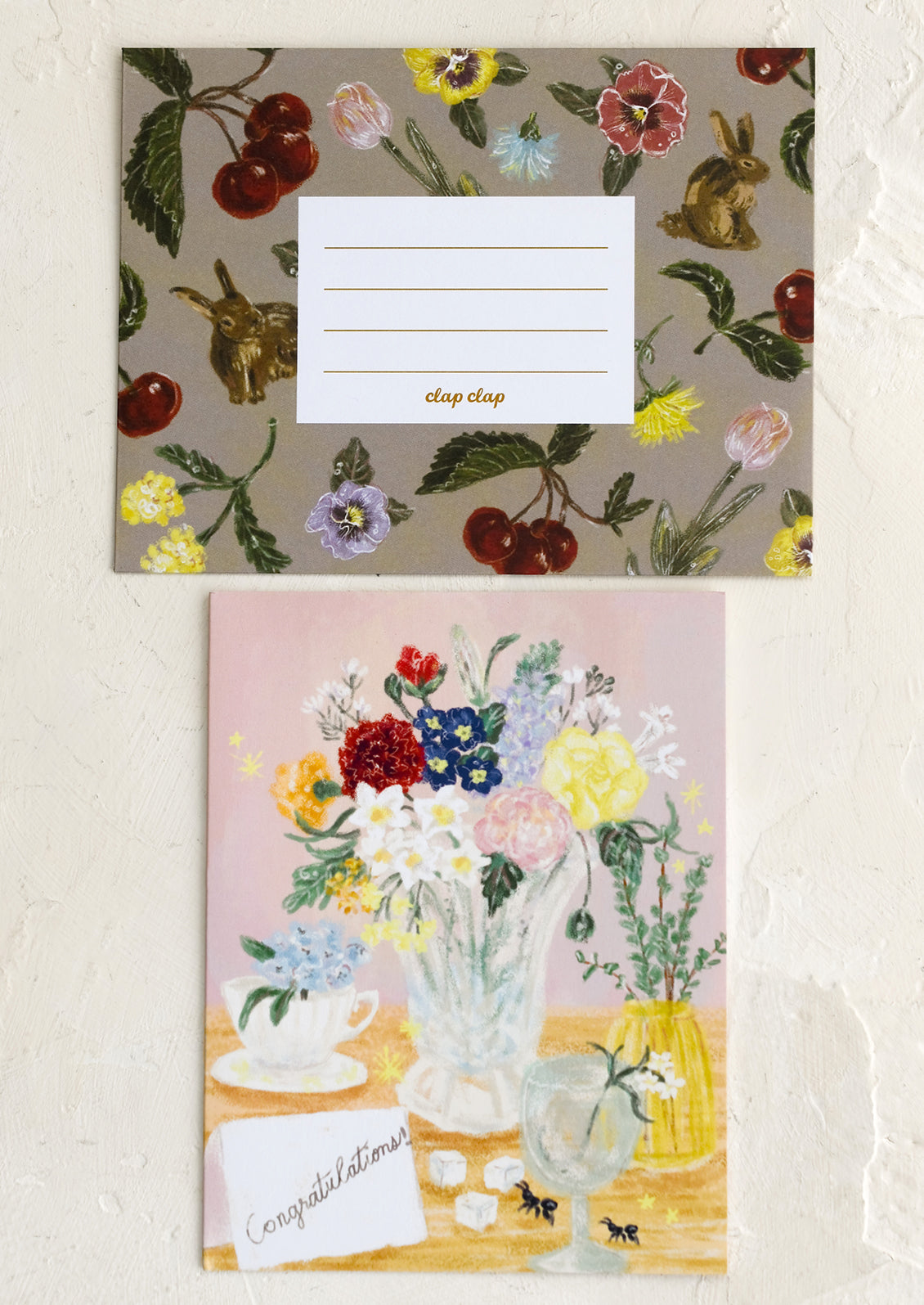 A tablescape print card with placecard illustration reading "Congratulations!".