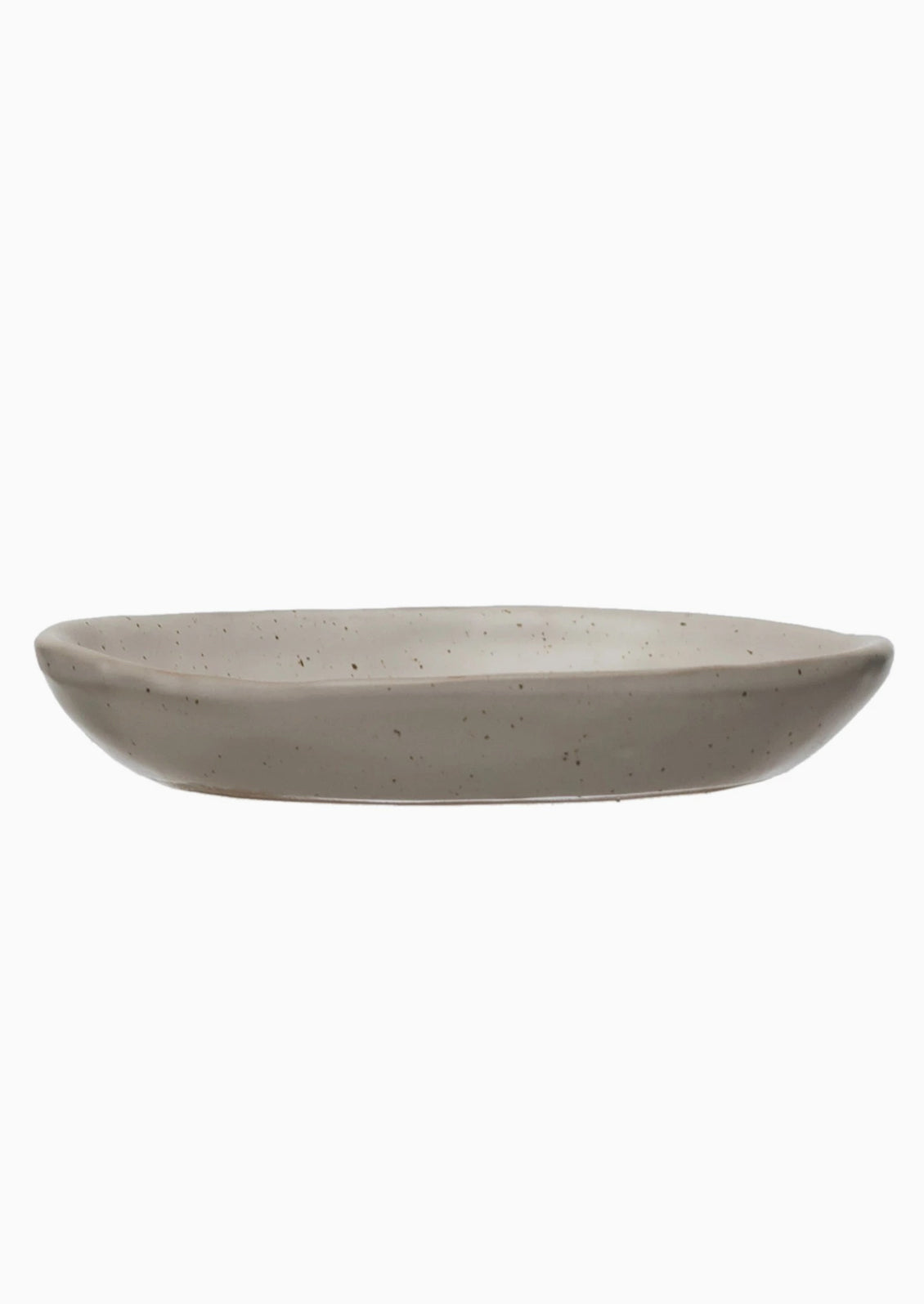 An egg shaped trinket dish in speckled white ceramic.