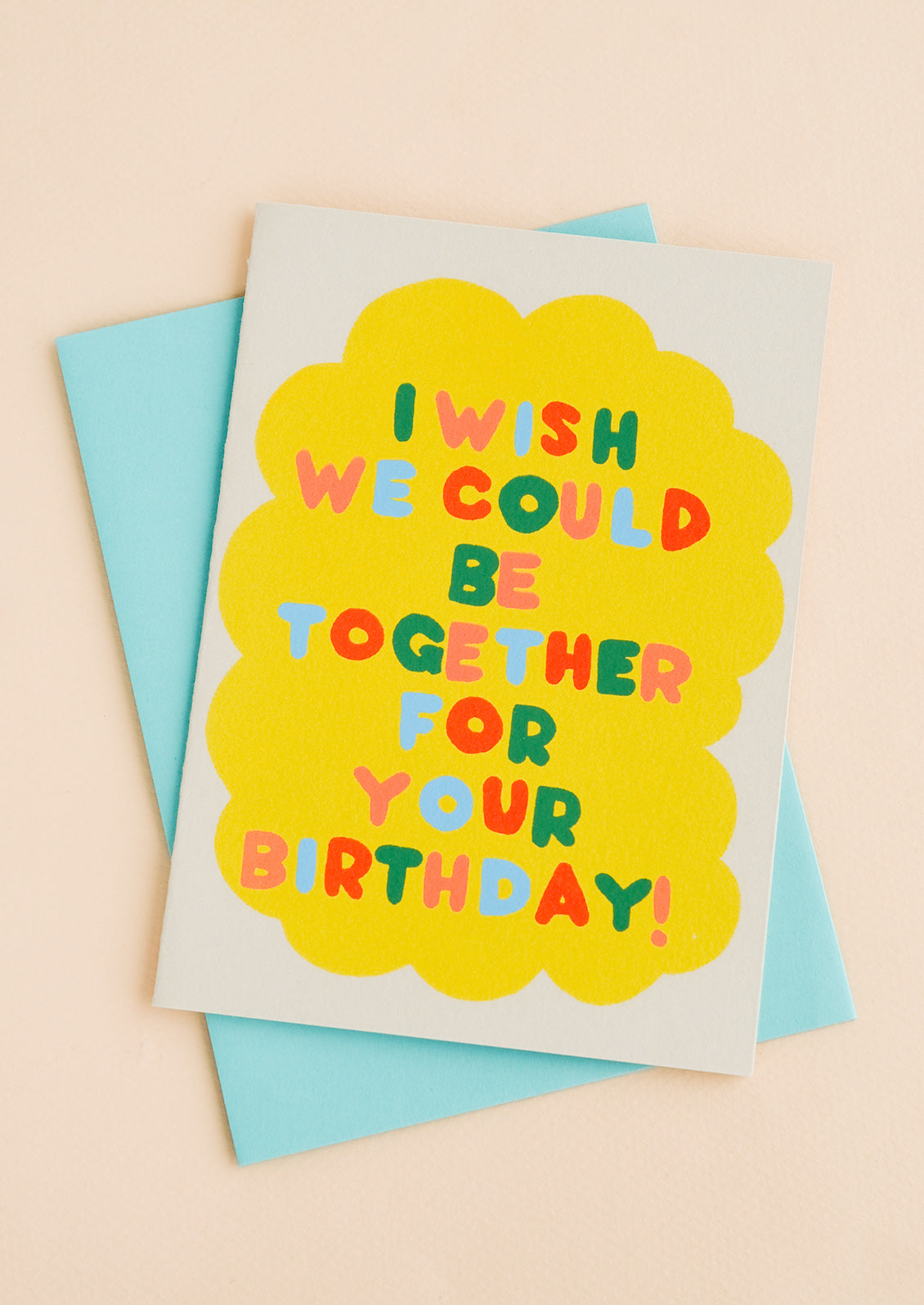 A birthday card with blue envelope.