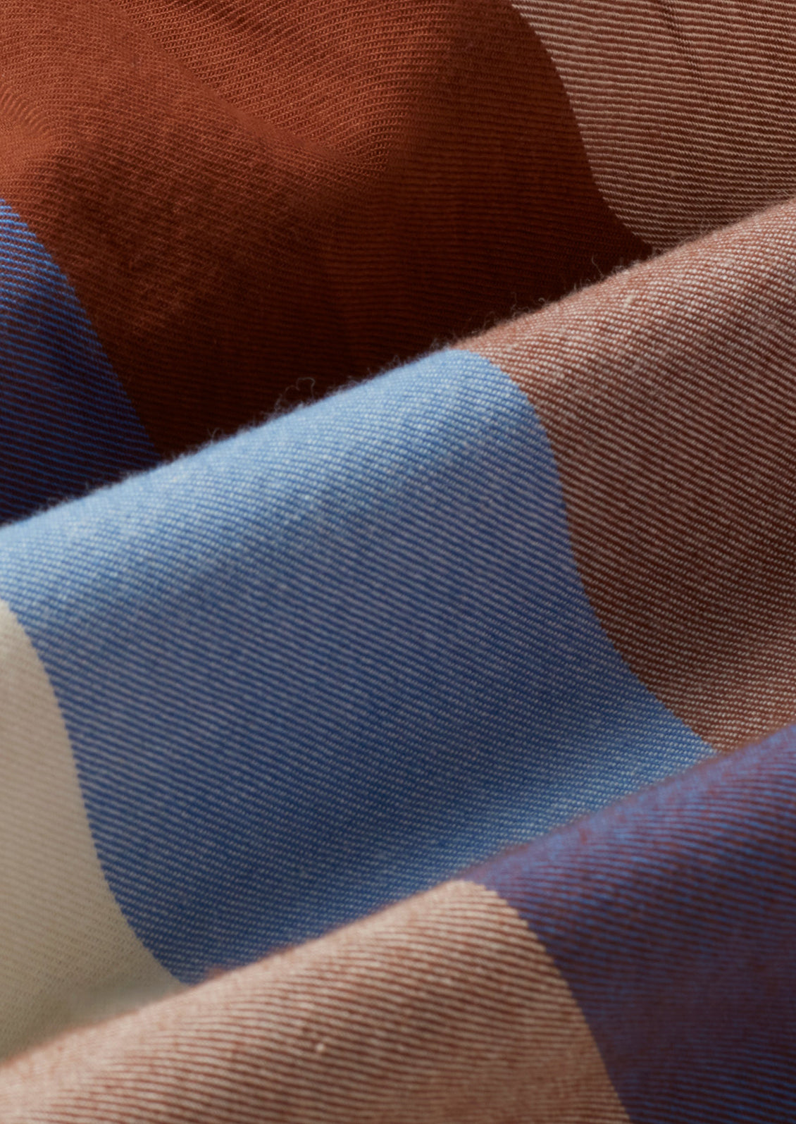 Multicolor madras cotton fabric with twill weave.
