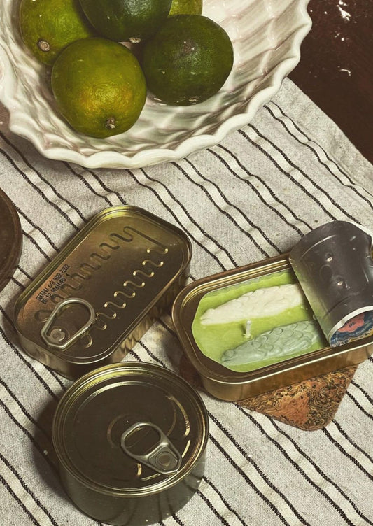 Multicolor tin of sardine candles.