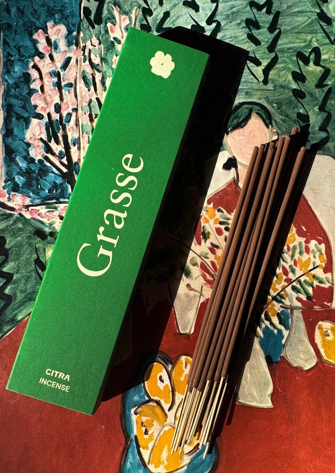 A pack of incense in "Grasse" scent, box is green.