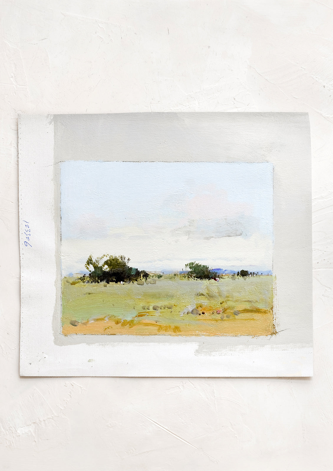 An original oil painting on unstretched canvas of landscape.