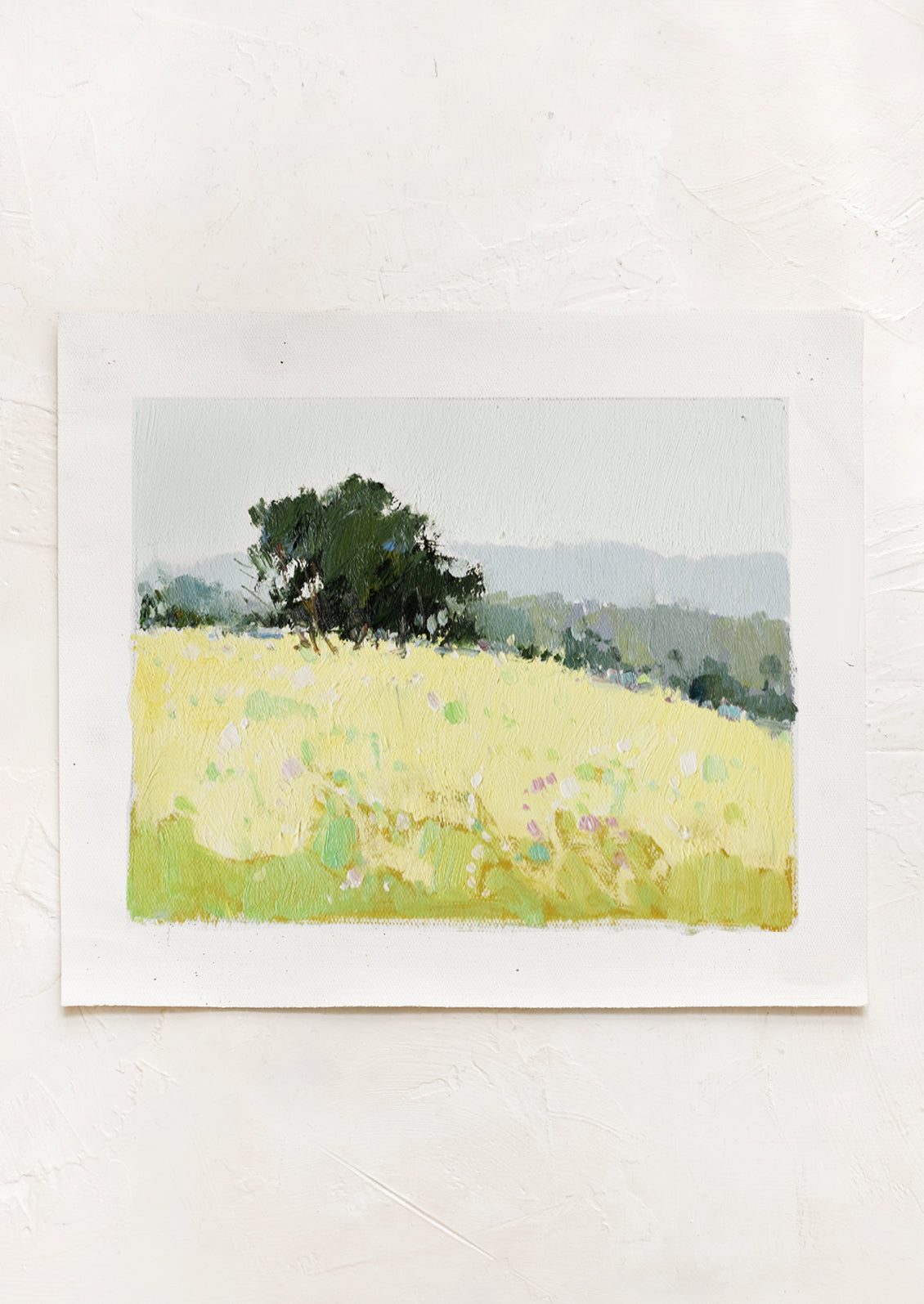 An original oil painting on unstretched canvas of landscape.