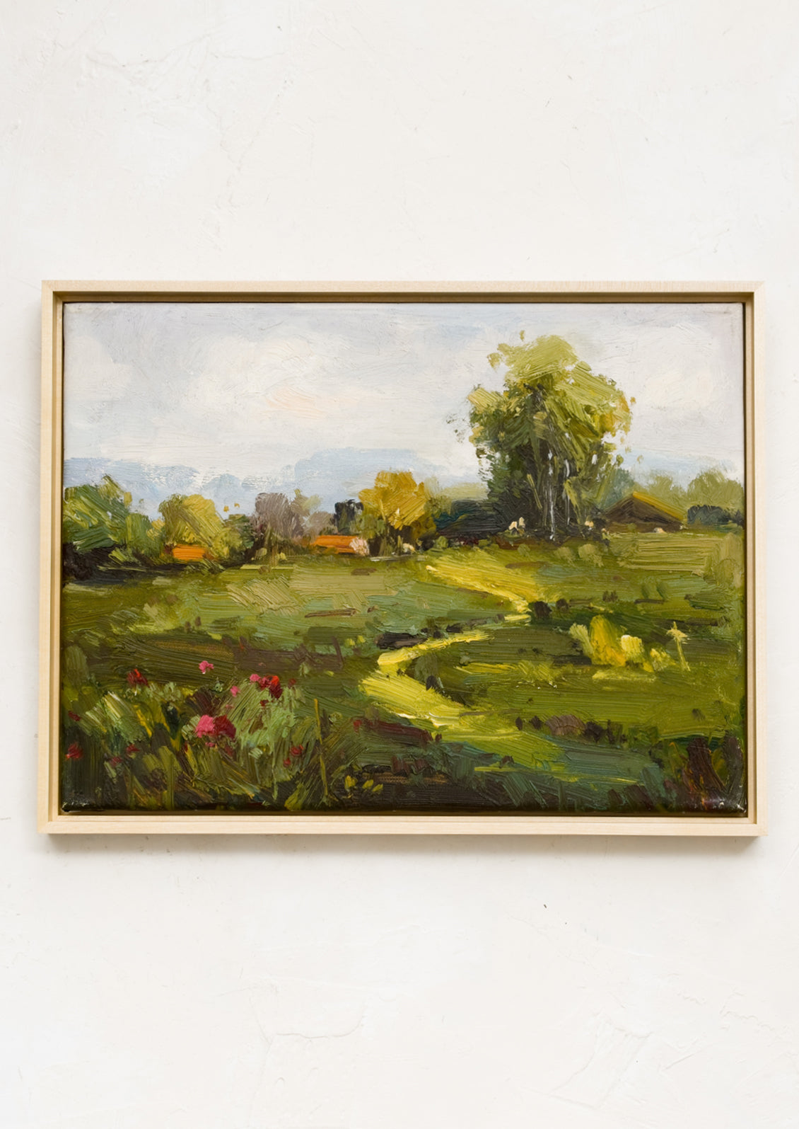 An original oil painting of a landscape in the country.